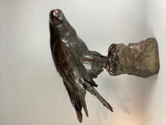 Sculpture grandeur nature d'un aigle en terre cuite et en bronze, réalisée par Reps & Trinte.