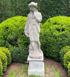 Statue en pierre de composition grandeur nature d'un chasseur gentilhomme
