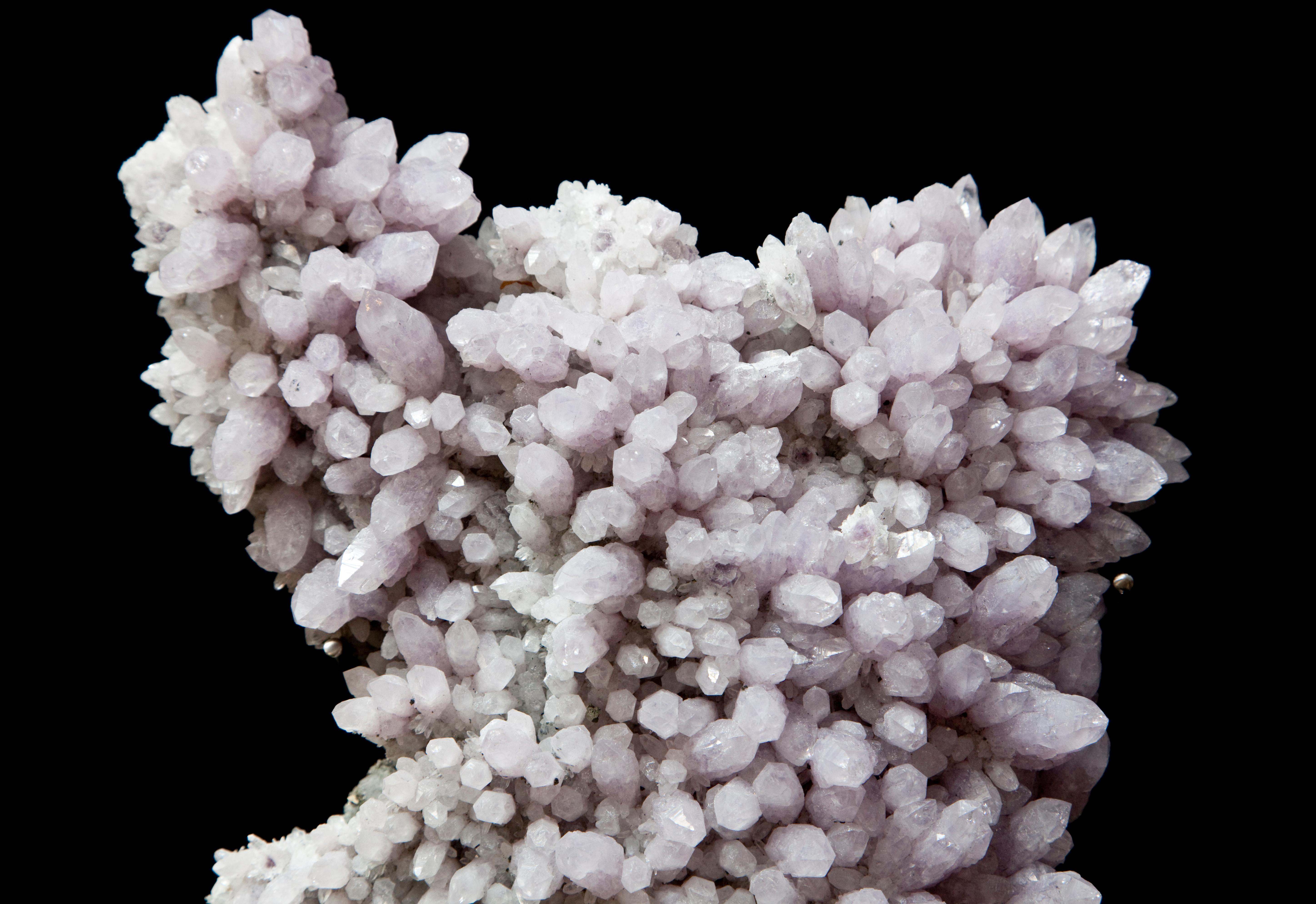 A lilac Amethyst crystal cluster mounted onto a mirrored steel base

-

Since 1986 Dale Rogers has been sourcing the grandest fossils, crystals and minerals from around the world. Through his company he has been supplying leading interior