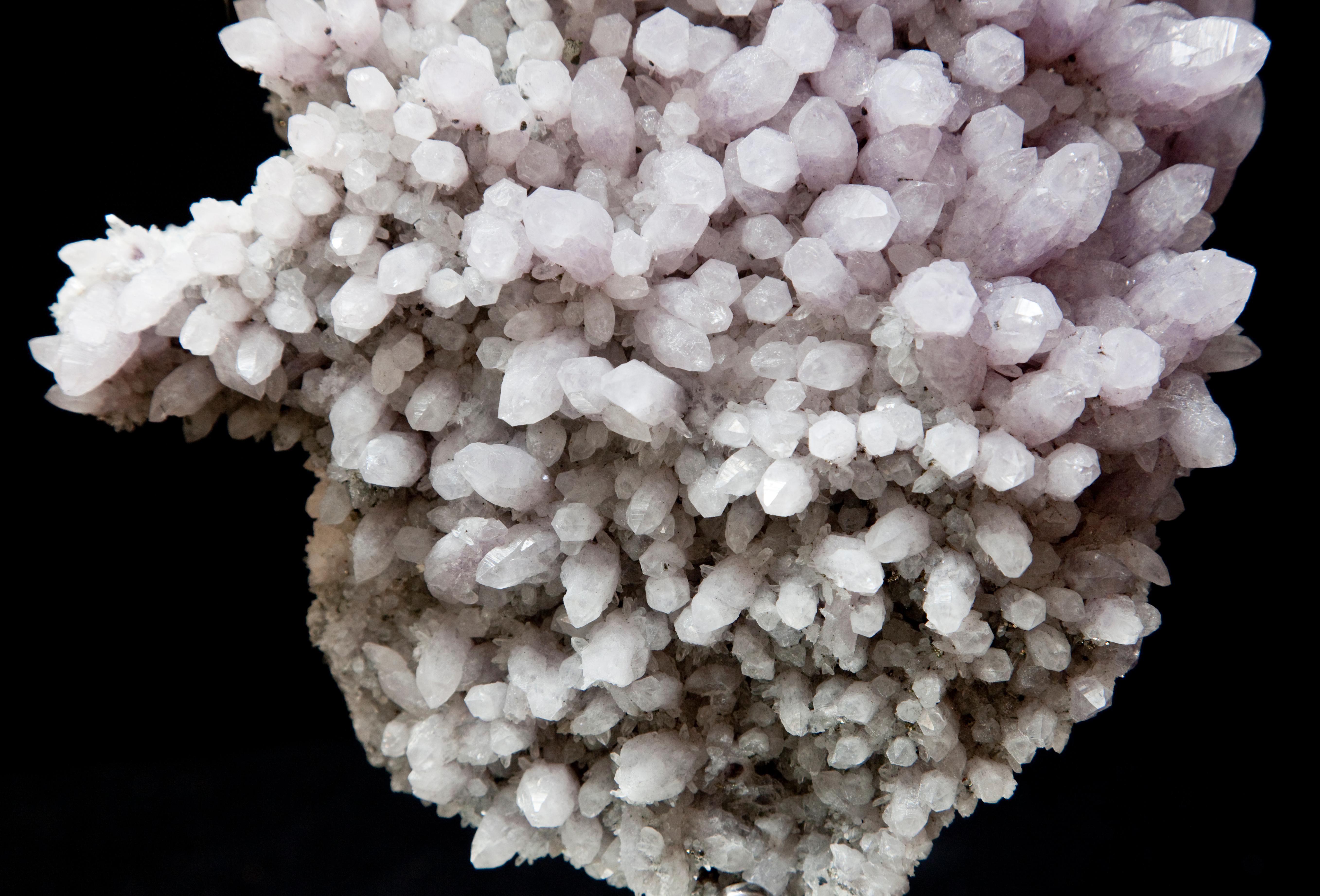 Brazilian A lilac Amethyst Crystal Cluster mounted onto a mirrored steel base