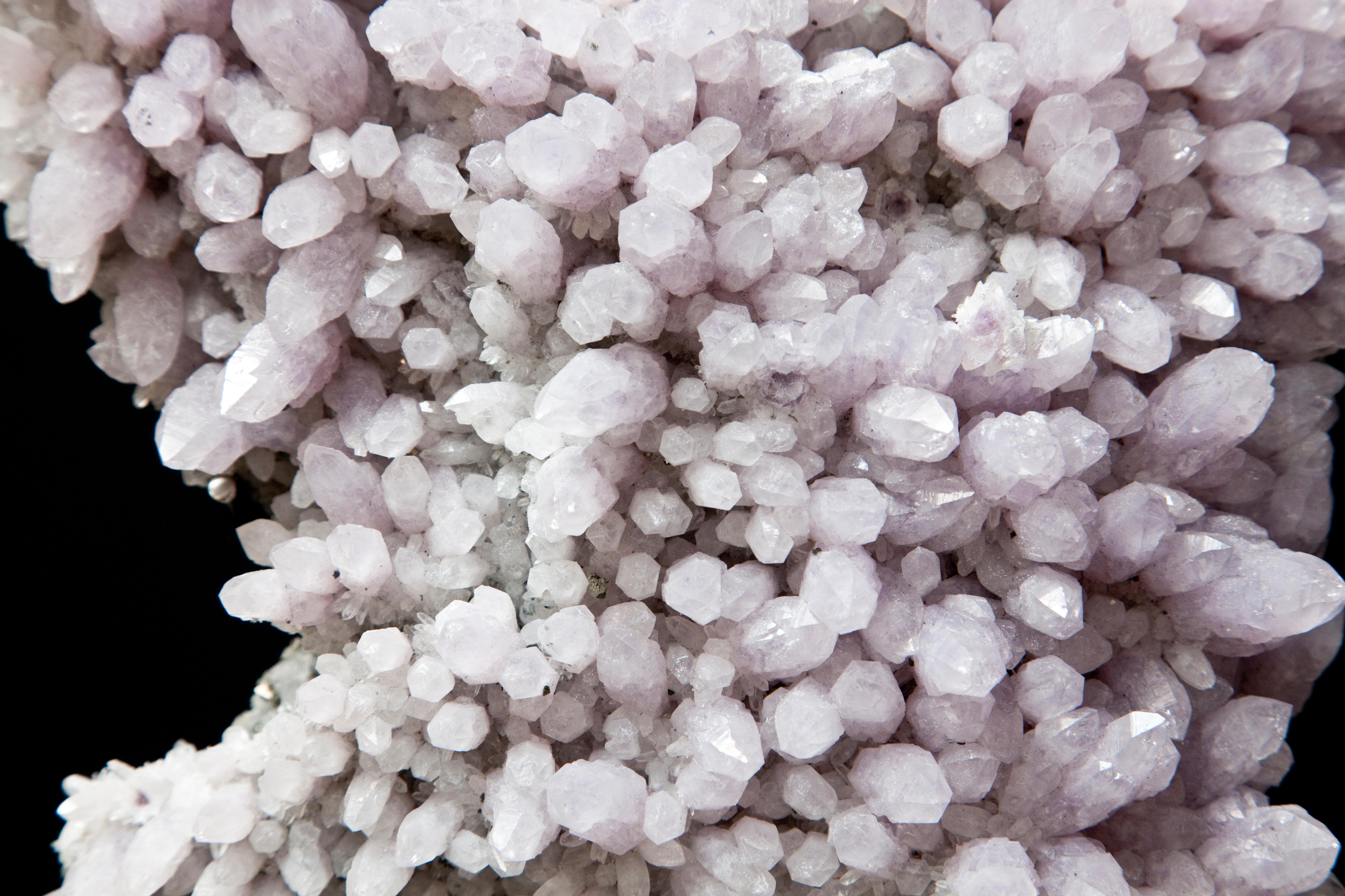 18th Century and Earlier A lilac Amethyst Crystal Cluster mounted onto a mirrored steel base