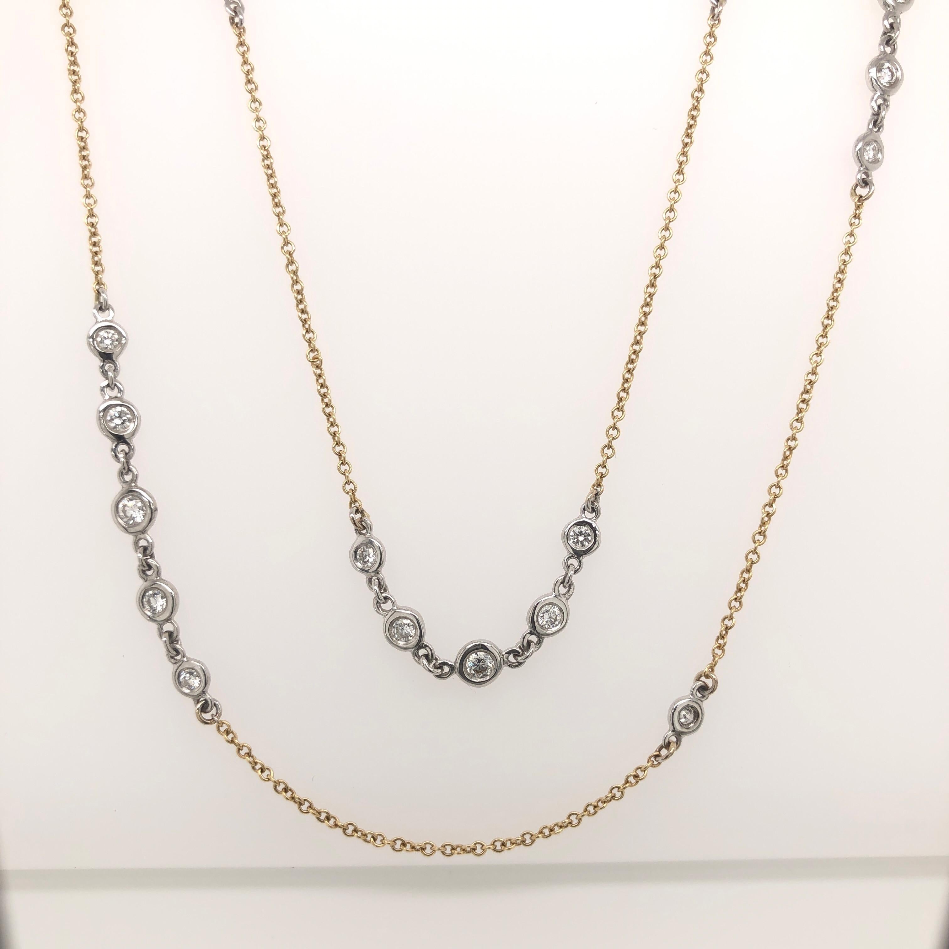 A Link Two Tone Necklace Diamond Chain set in 18K White and Yellow Gold.  Wear this Diamond chain long or doubled.  This Necklace is so versatile.  The necklace has 41 Round Brilliant Diamonds bezel set in White gold creating a super brilliant