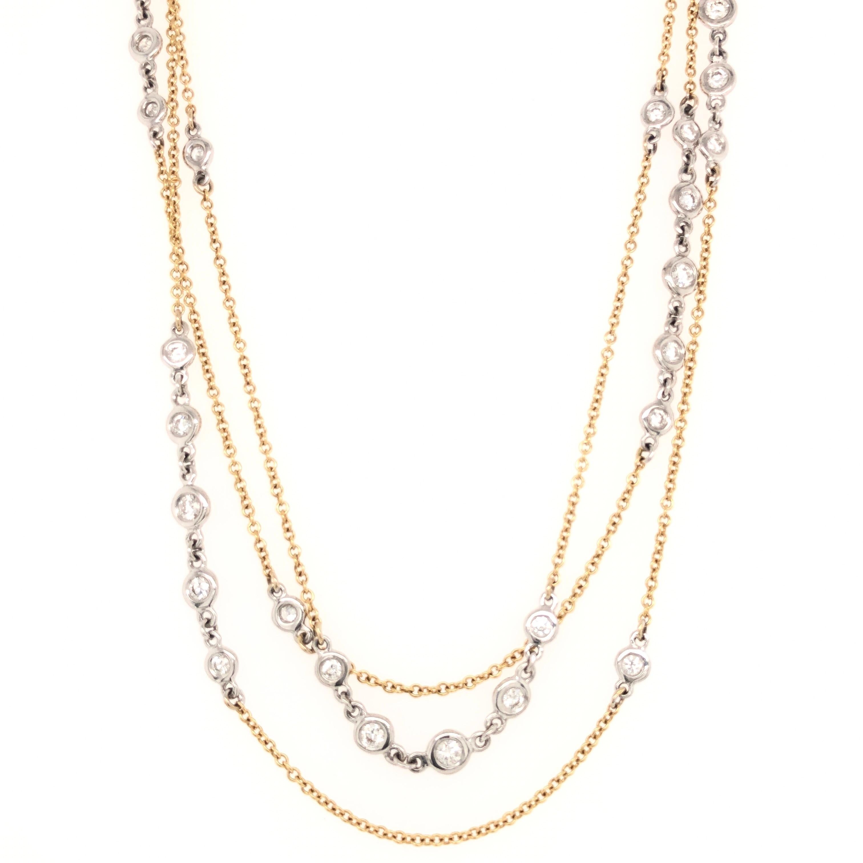  A Link Necklace Diamond Chain set in 18K White and Yellow Gold.  Wear this Diamond chain long or doubled.  This Necklace is so versatile.  The necklace has 41 Round Brilliant Diamonds bezel set in White gold creating a super brilliant Diamond link.