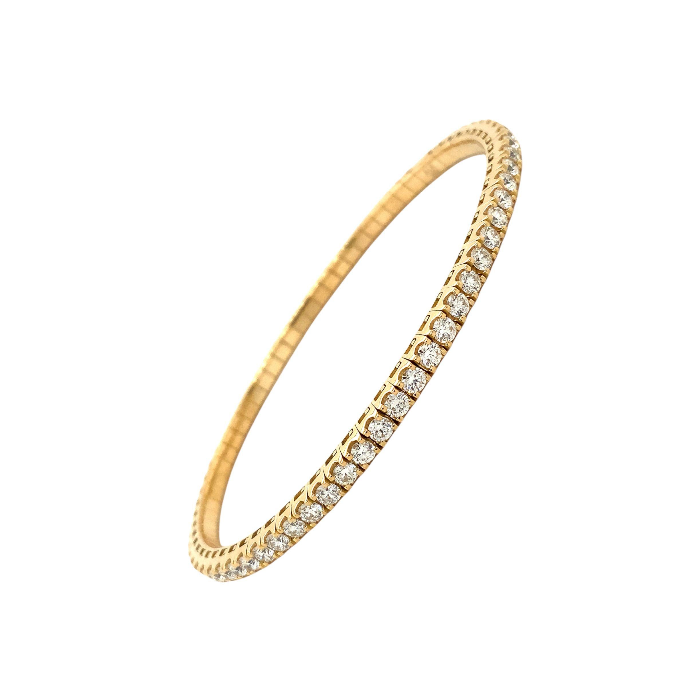 A Link Collection Stretchy Diamond Bracelet 3.44ct Set in 18K Yellow Gold.
This is so easy!  This Bracelet has no clasp it's super simple to put on and take off!
68 Round Brilliant Cut Diamond =3.44 cts. tw.
F in Color
VS in Clarity
Excellent Make