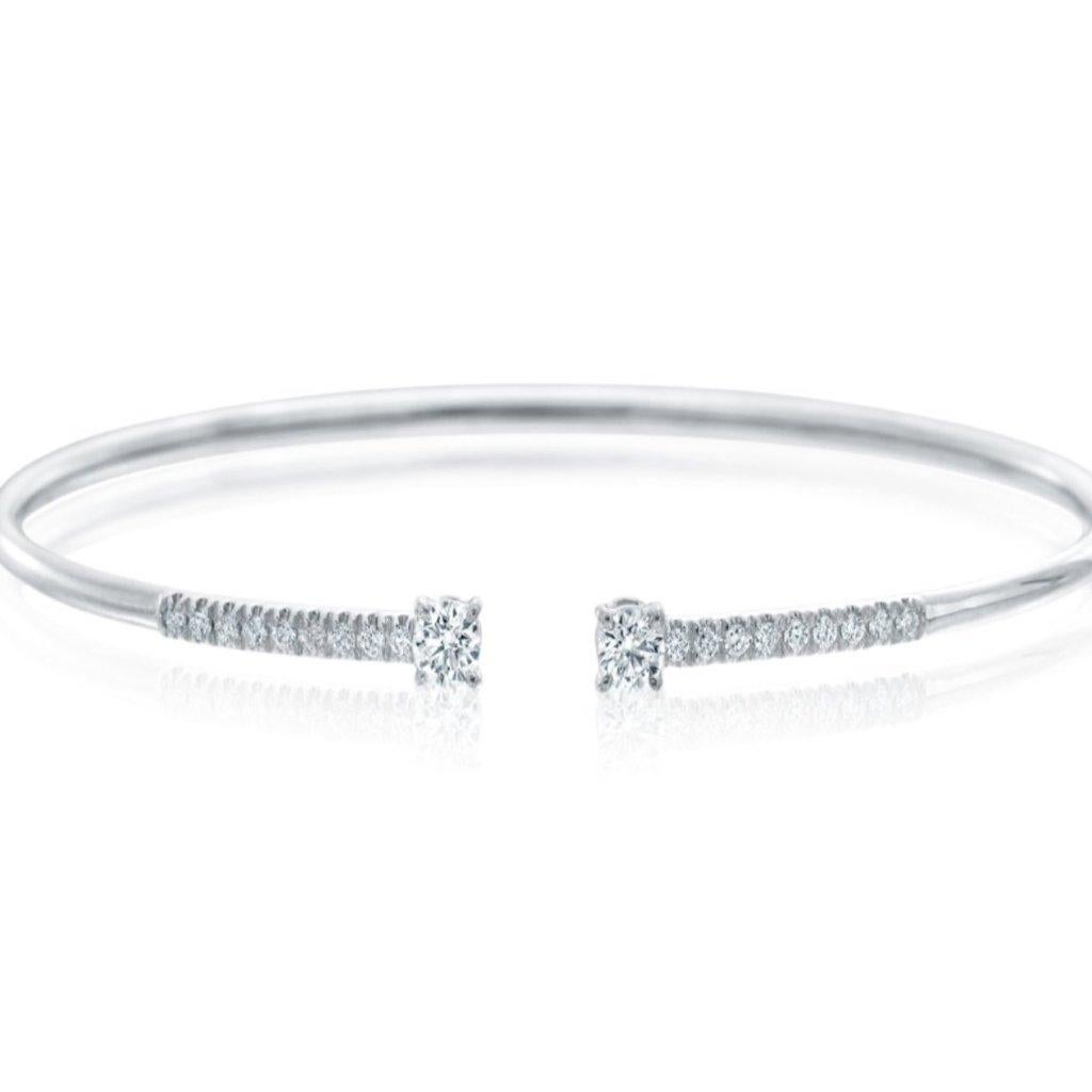 A Link Diamond Bangle Cuff Bracelet  18 Karat white gold. These Ideal cut diamonds are 4 prong set. This bracelet measures 1.9 mm - 3.65 mm. The outside dimensions Are 60 x 50 mm Oval. Gold weight 4.4g, 20 diamonds equal to 0.48 cts t.w. F Color and