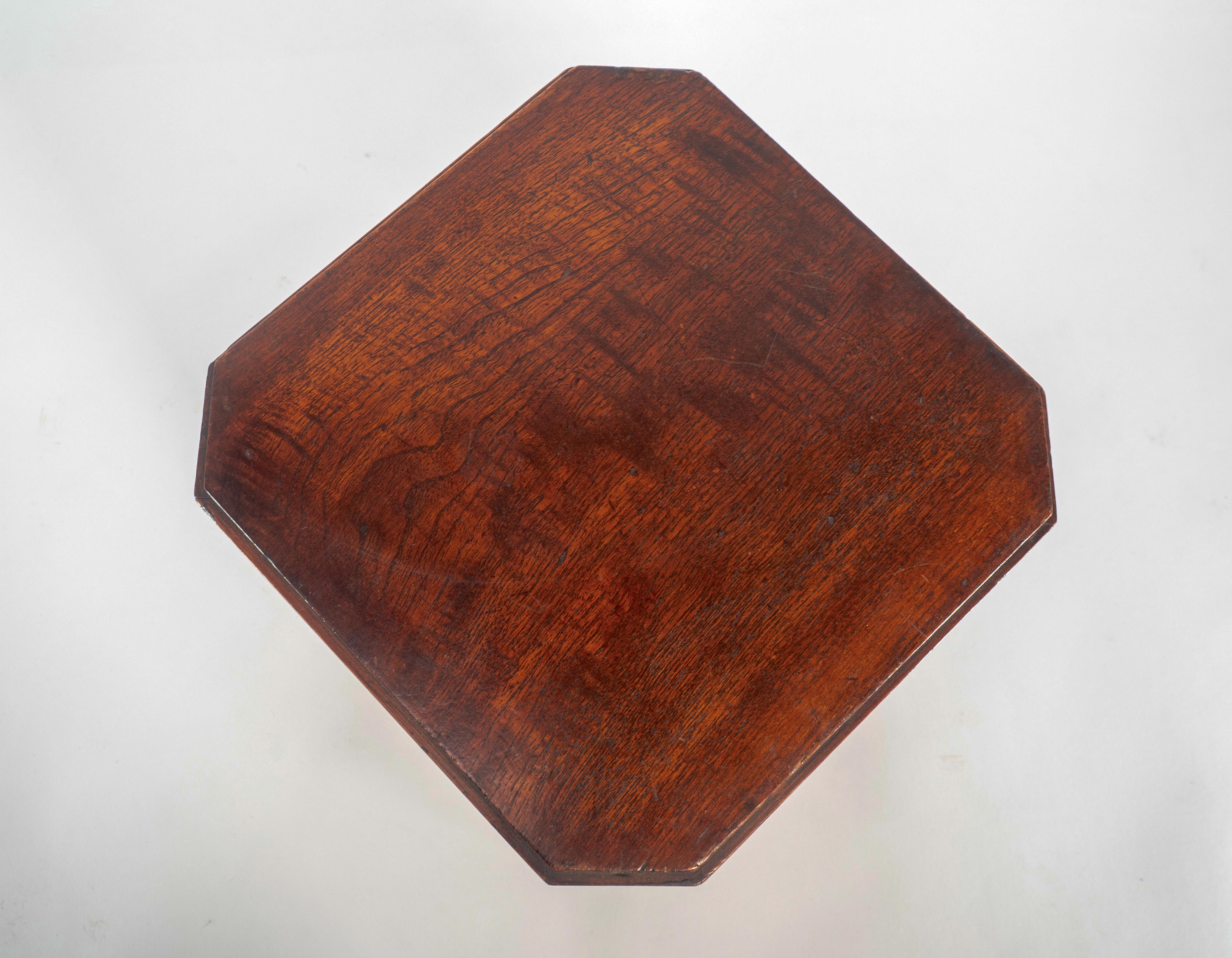 A little Art Deco Walnut side table the legs follow down to a cross stretcher. For Sale 2