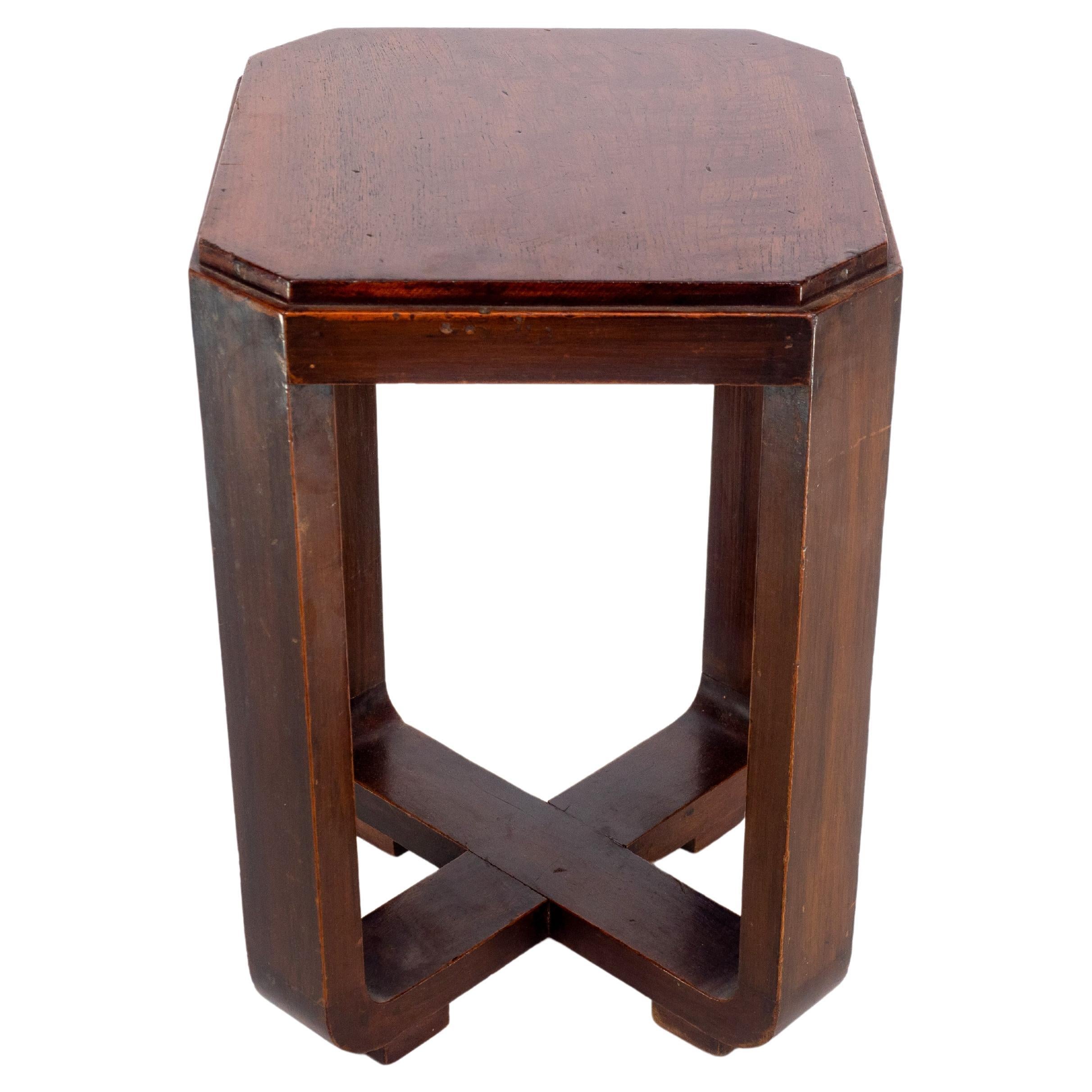 A little Art Deco Walnut side table the legs follow down to a cross stretcher. For Sale