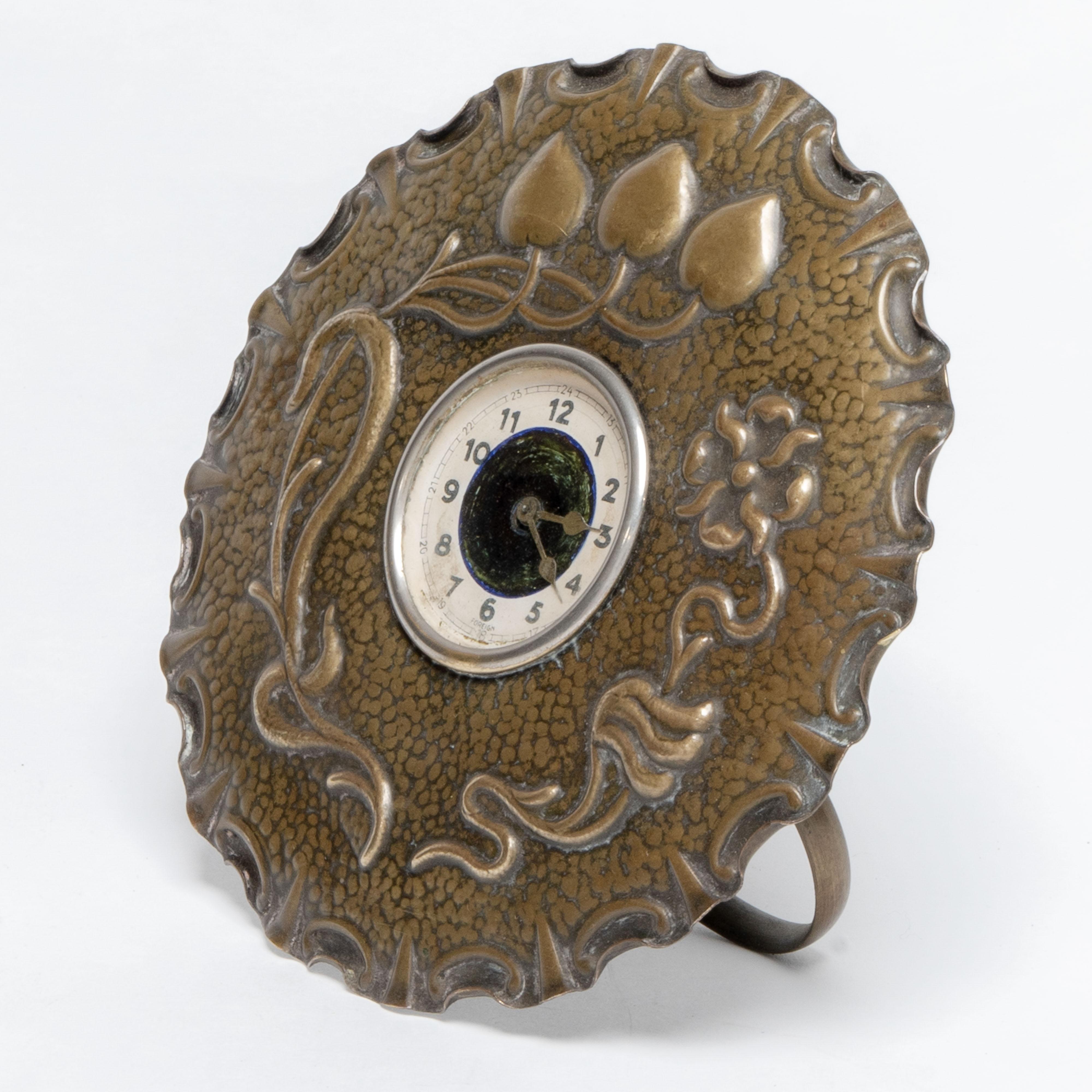 Arts and Crafts A little Arts & Crafts copper table clock in the shape of a flower head For Sale