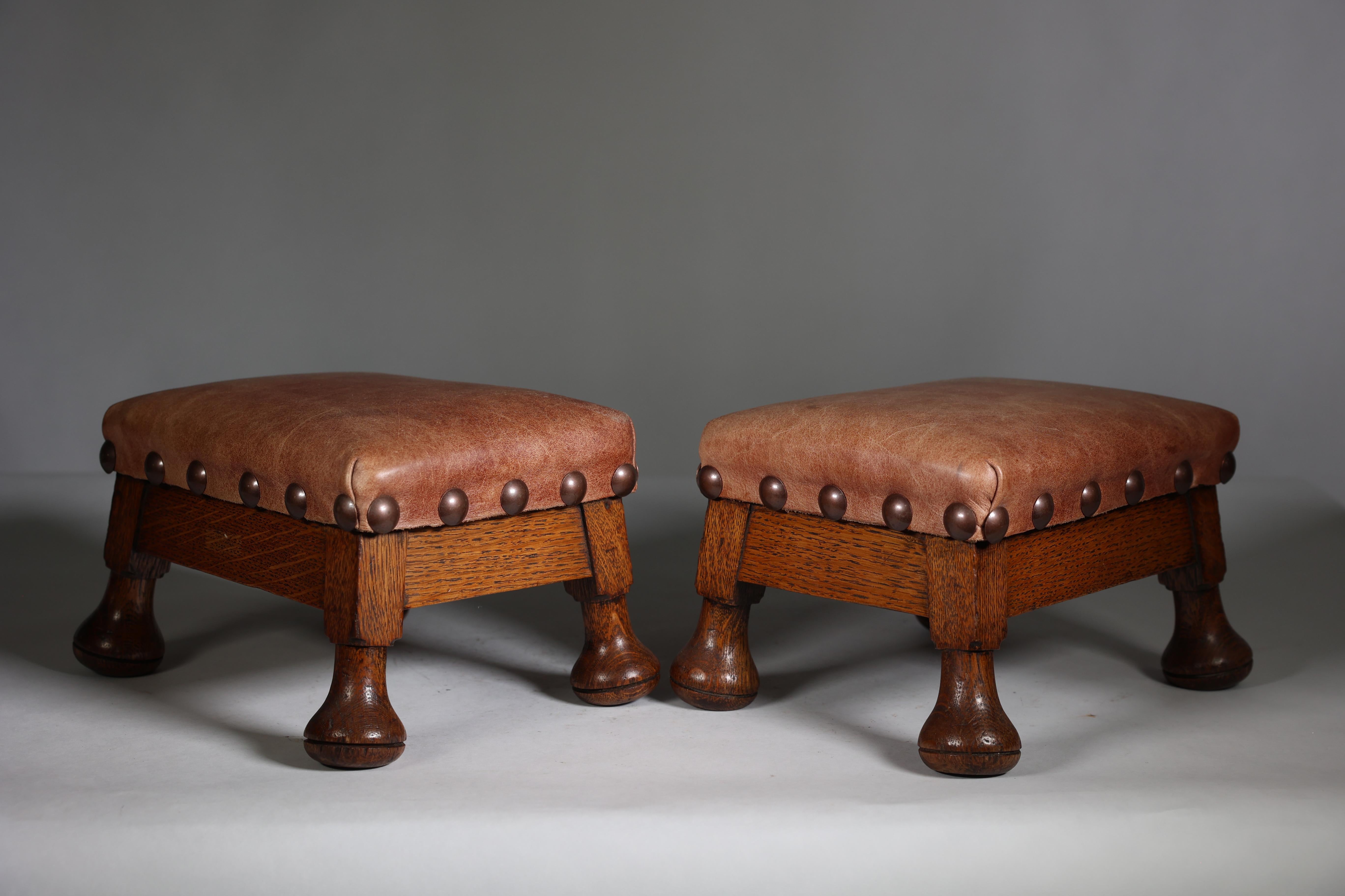 A little pair of Aesthetic Movement oak Thebe stools with leather studded seats For Sale 1