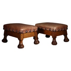 A little pair of Aesthetic Movement oak stools with leather studded seats