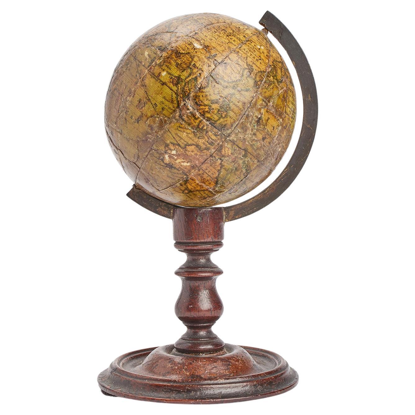 Un petit globe terrestre de Newton, Londres 1820. 