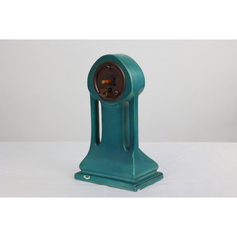 A little turquoise blue dressing table clock decorated with cherubs by a tree. In Good Condition For Sale In London, GB