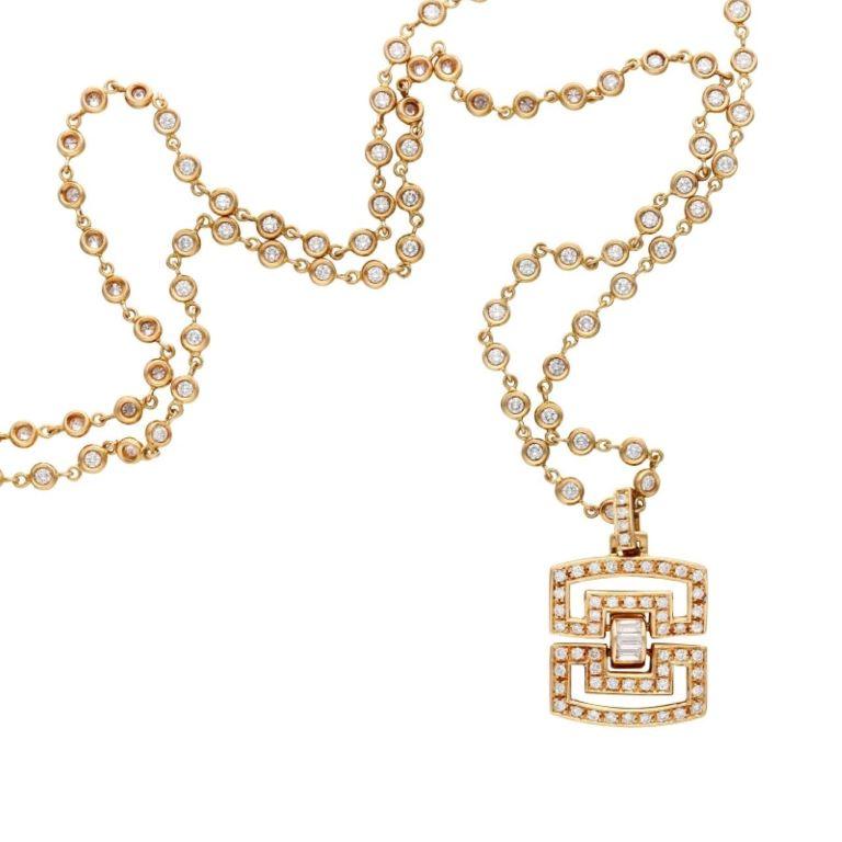 Lange Halskette mit Gold- und Diamantanhängern  (Brillantschliff) im Angebot