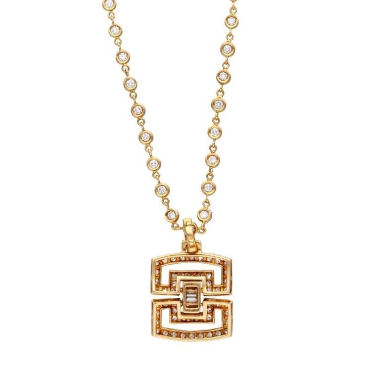 A Long Gold and Diamond Pendant Necklace  In Excellent Condition For Sale In New York, US