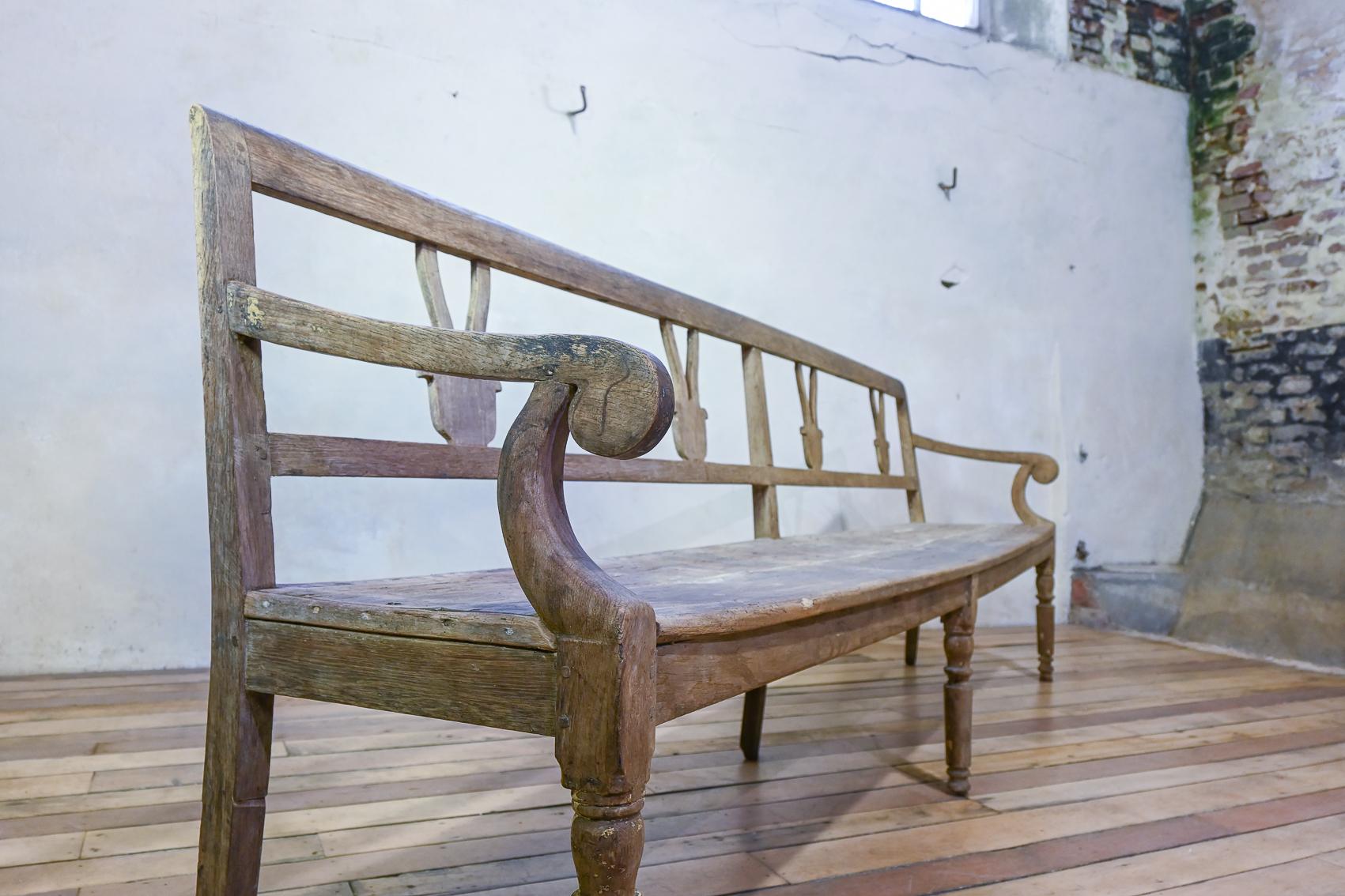 rustic bench with cushion