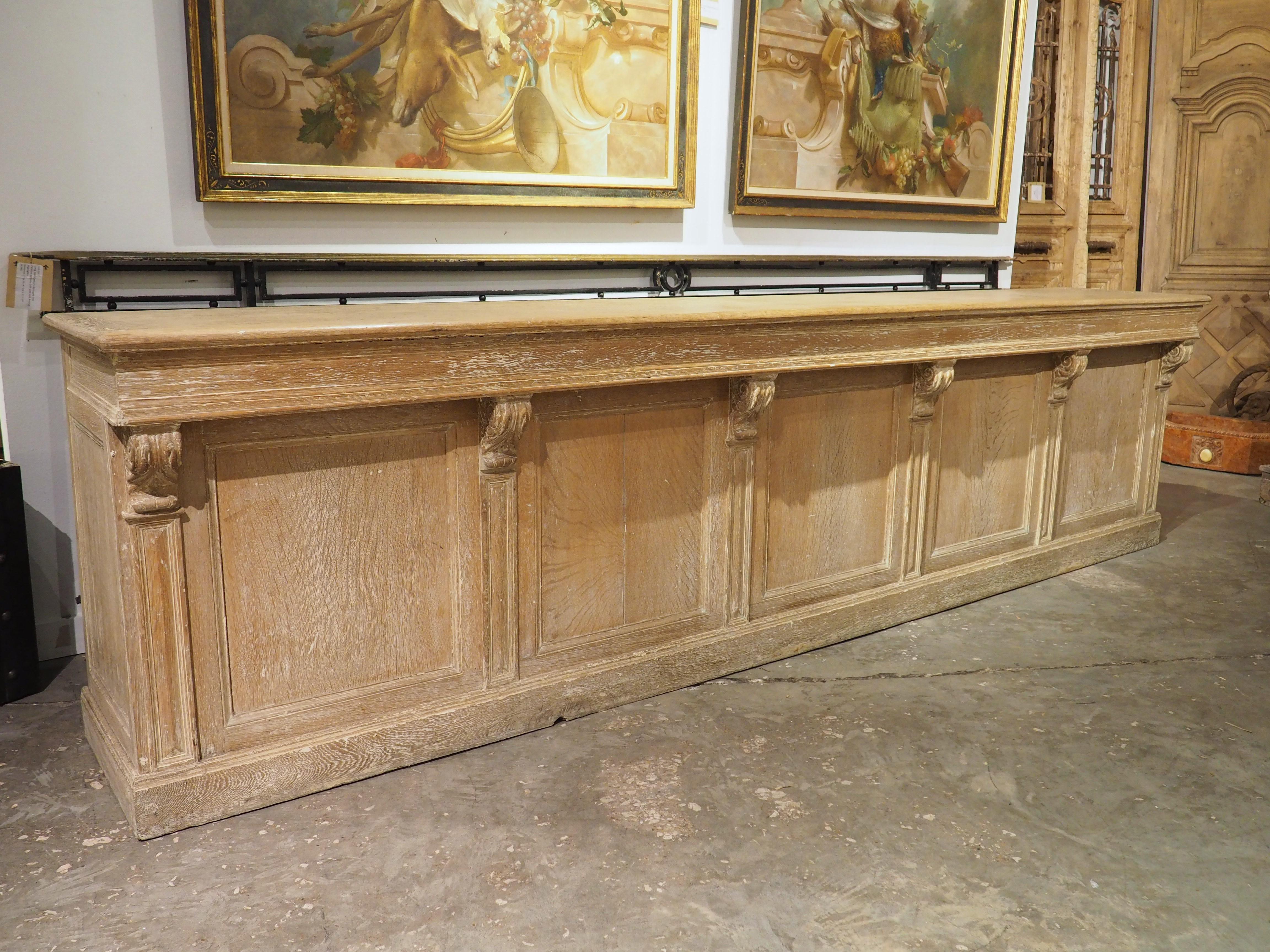 A Long Antique French Oak Shop Counter, Circa 1900, 124.5 Inches In Good Condition For Sale In Dallas, TX
