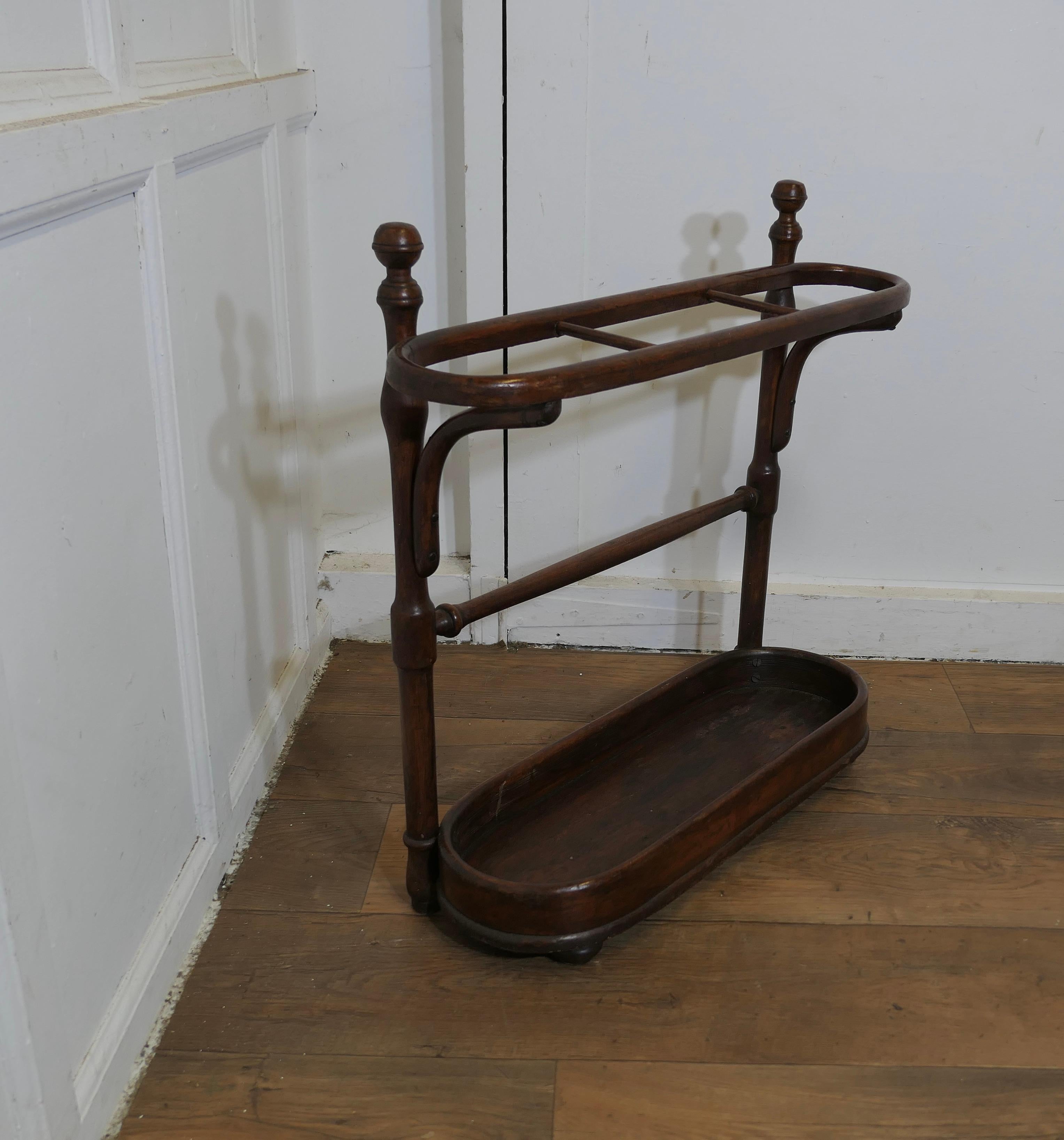 A Long Bentwood Stick Stand or Umbrella Stand  This is a good Umbrella stand 1