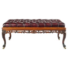 A long early Victorian rosewood stool
