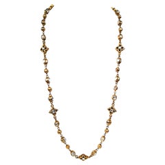 A long gilt metal and paste link necklace/sautoir, Chanel, 1980s