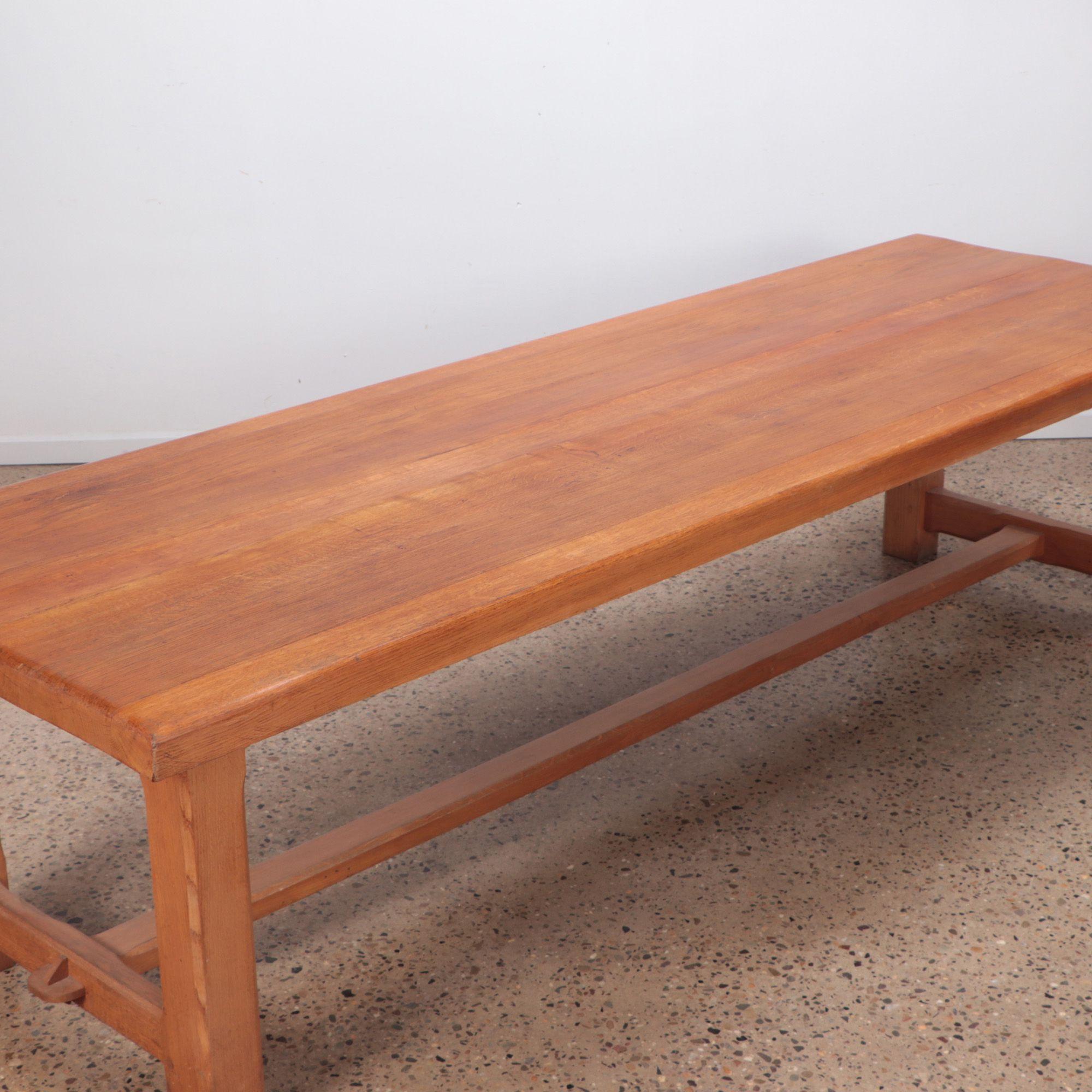 A long oak console/dining room table, 4 legs and support beam, French, circa 1960.