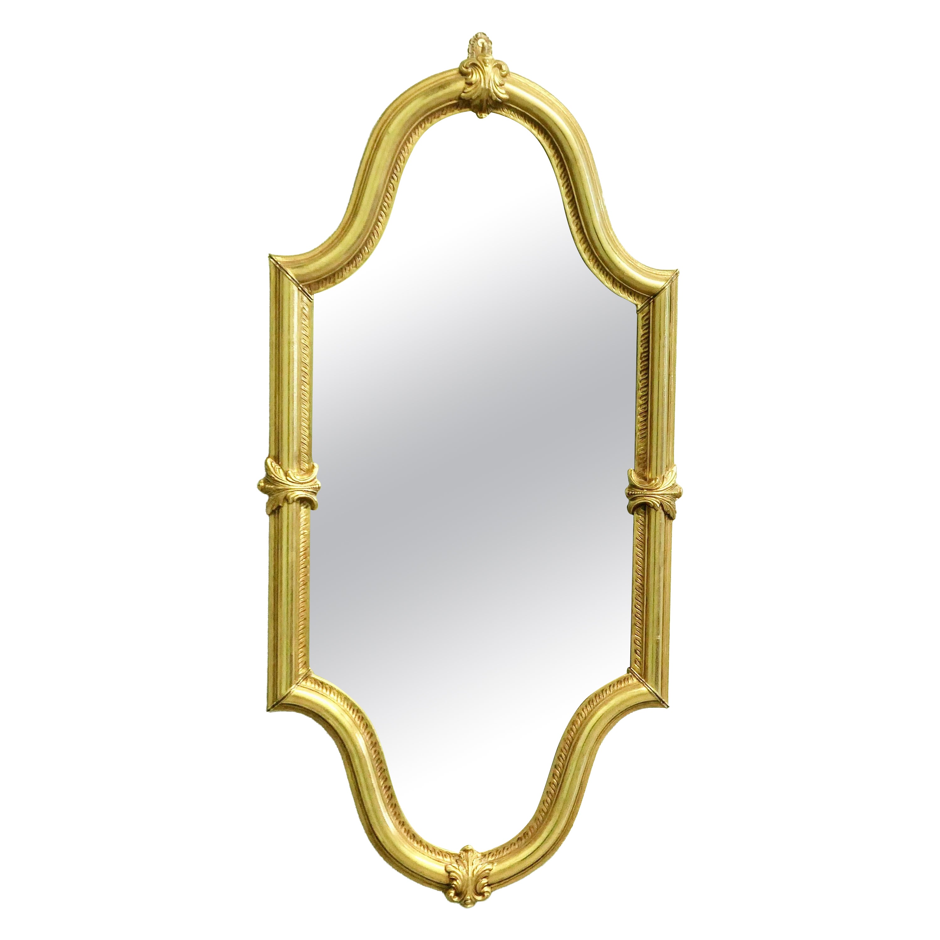 A Long Shaped Oval Brass Wall Mirror The Mirror has a decorative Acanthus Leaf For Sale