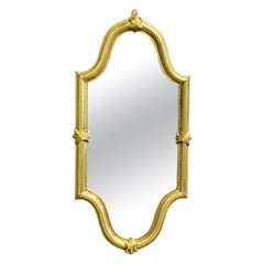 A Long Shaped Oval Brass Wall Mirror The Mirror has a decorative Acanthus Leaf