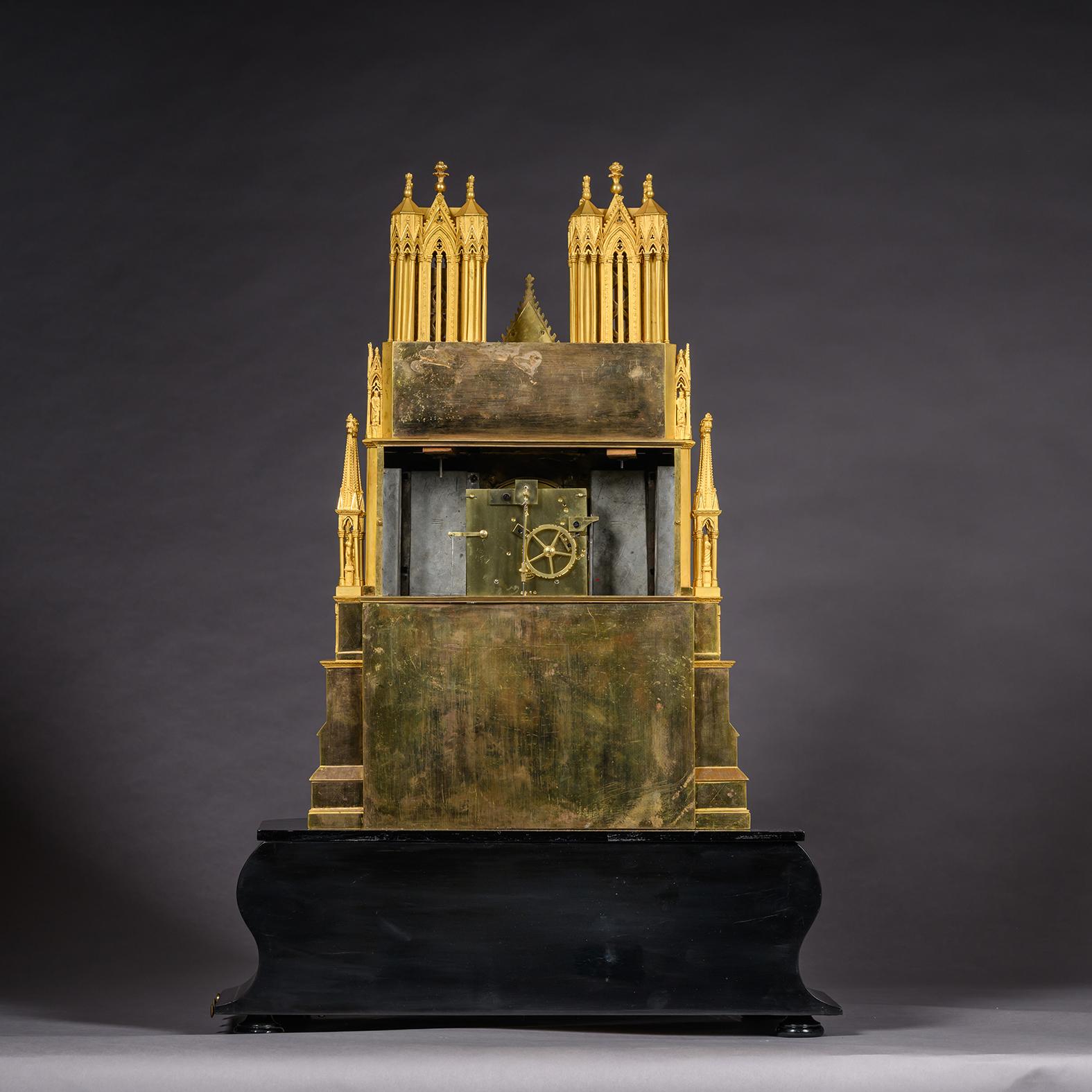 XIXe siècle A Louis Philippe Gilt-Bronze 'Reims Cathedral'  Musical Mantel Clock en vente