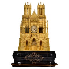 A Louis Philippe Gilt-Bronze 'Reims Cathedral'  Musical Mantel Clock