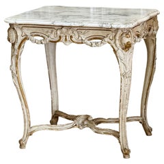 A Louis XV Carved, Parcel Gilt, and Paint Table - signed Lebas