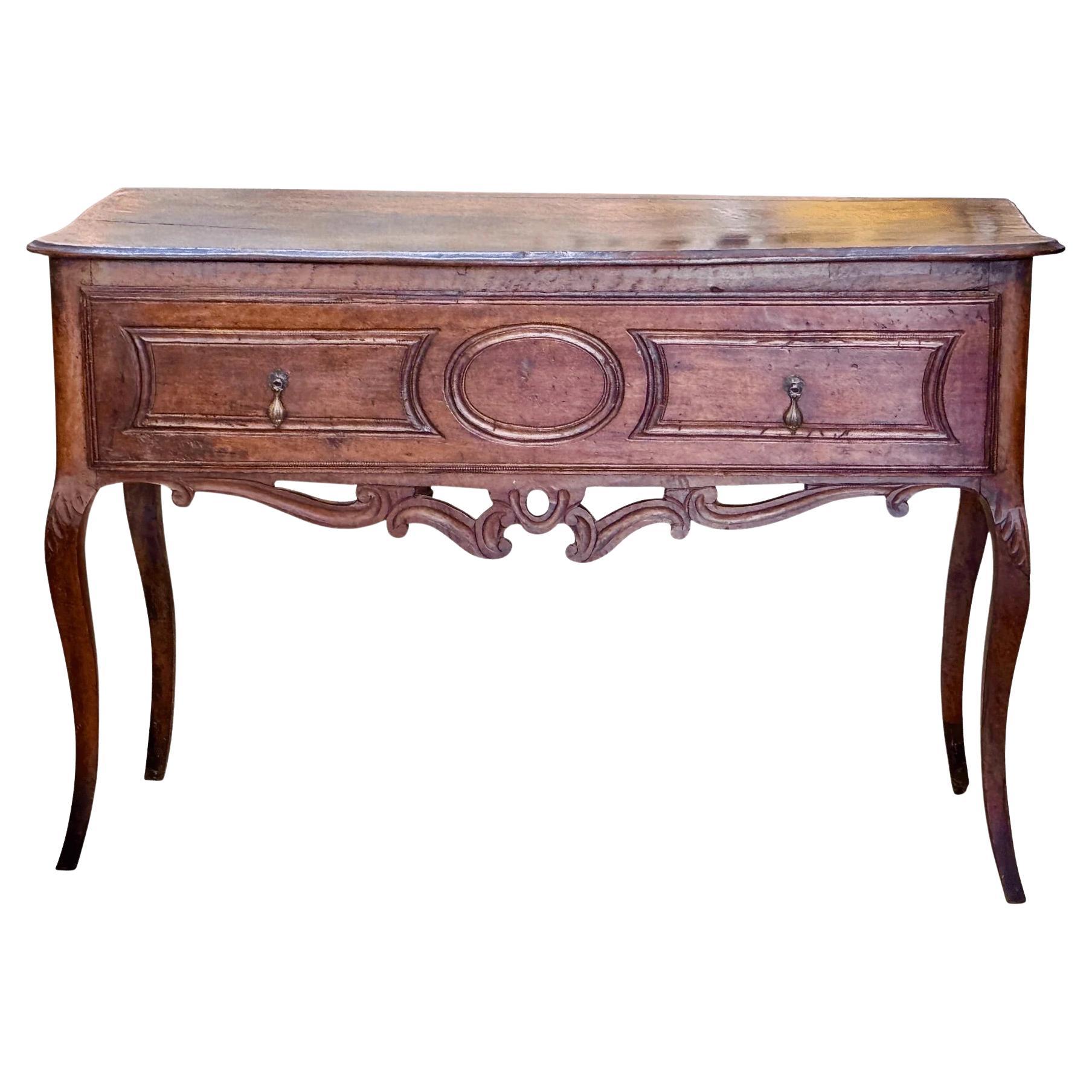 A Louis XV console or side table in richly patinated walnut For Sale