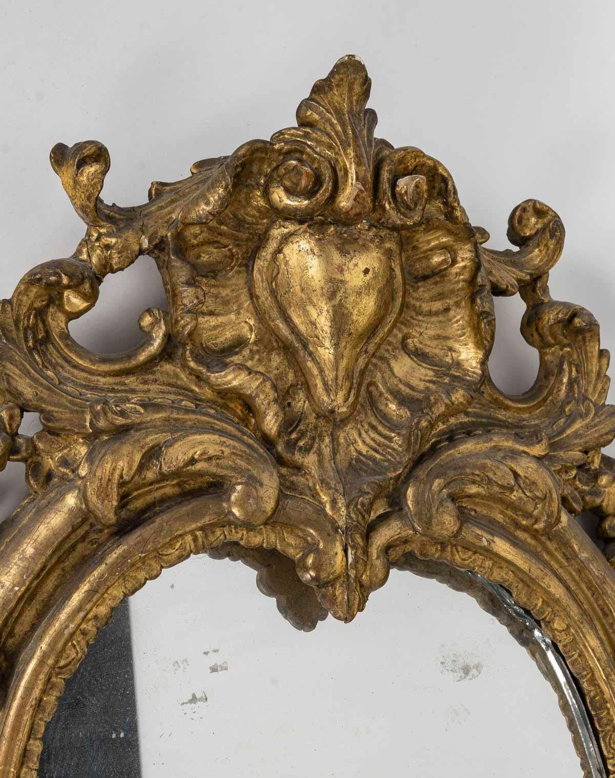 French A Louis XV Period Carved and Gilded Wood Wall Mirror, 18th Century. For Sale