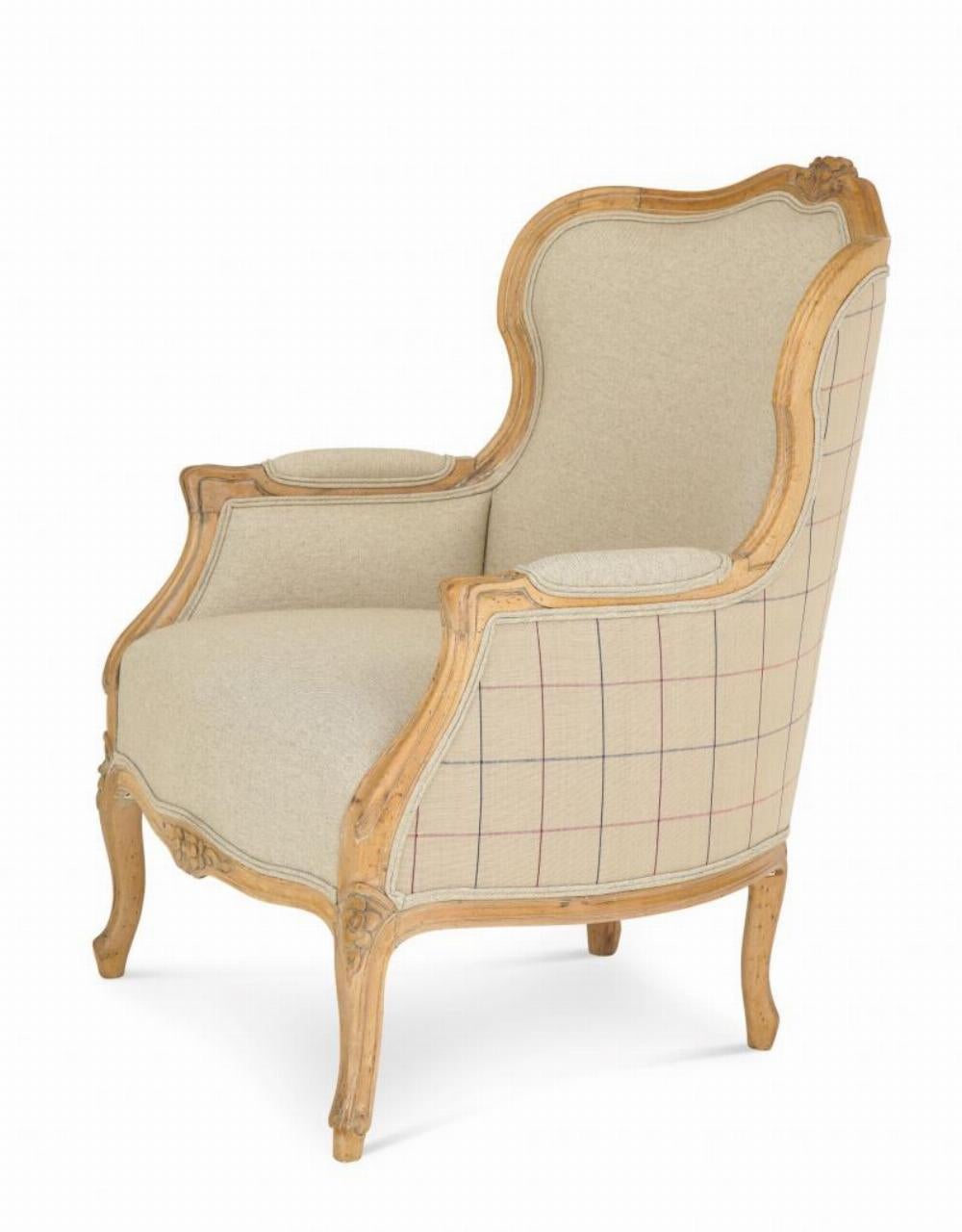 A Louis XV style armchair with a very classic French accent in a beige linen. 1940's