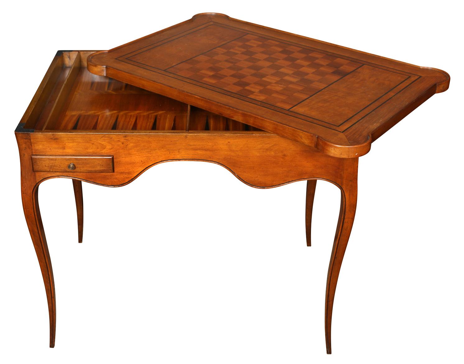 A pretty little Louis XV style fruitwood games table with a reversible top with a chess and checkerboard, opposing a felt lined card surface. The interior features a backgammon board and two side drawers and the table is raised on cabriole legs. 