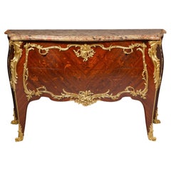 A Louis XV Style Gilt-Bronze and Marquetry Commode By Paul Sormani, Paris.