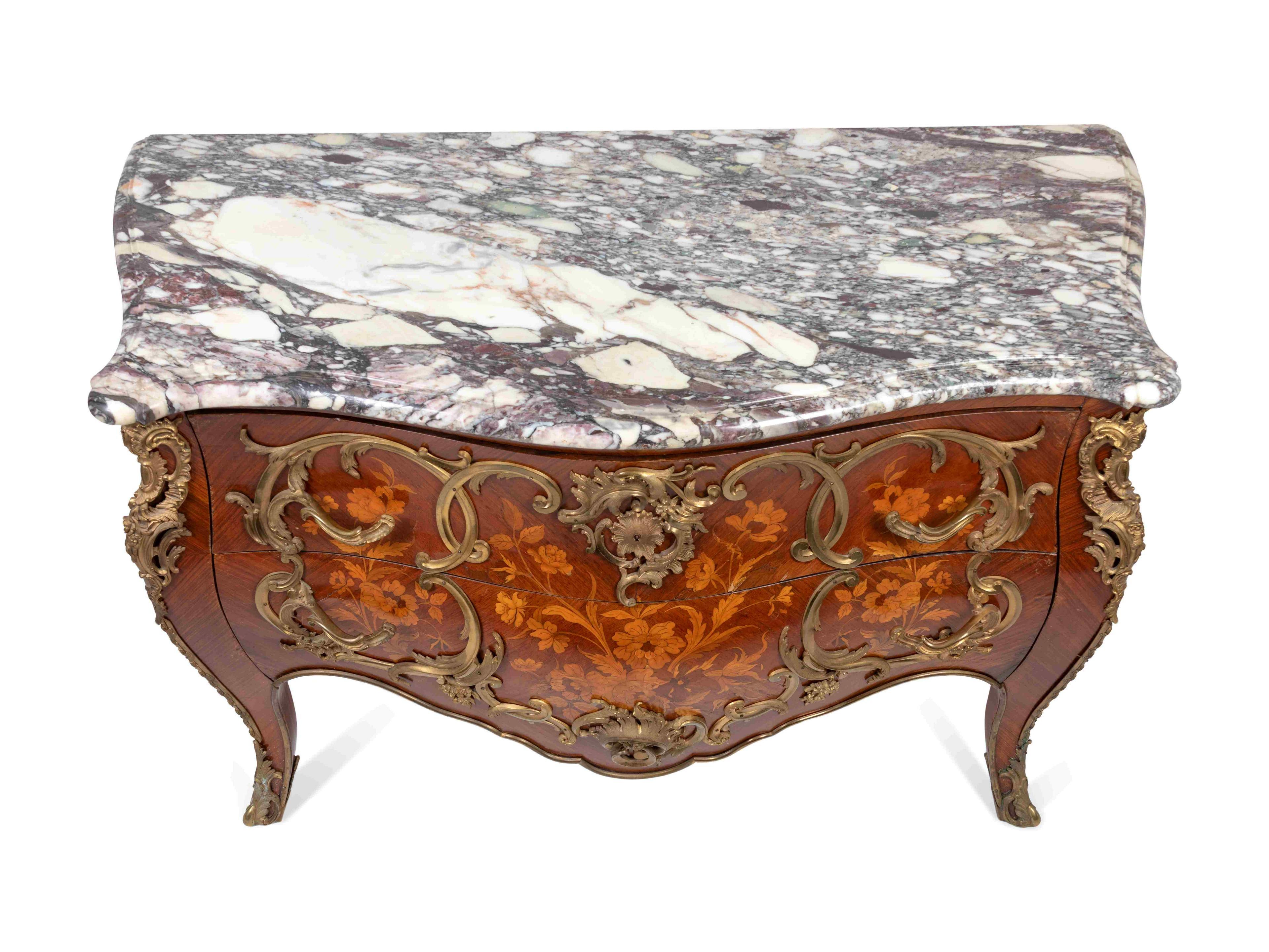 A Louis XV style gilt bronze-mounted marquetry commode. Superb Breche Violette Marble Top.  France, Late 19th century
Dimensions: Height 35