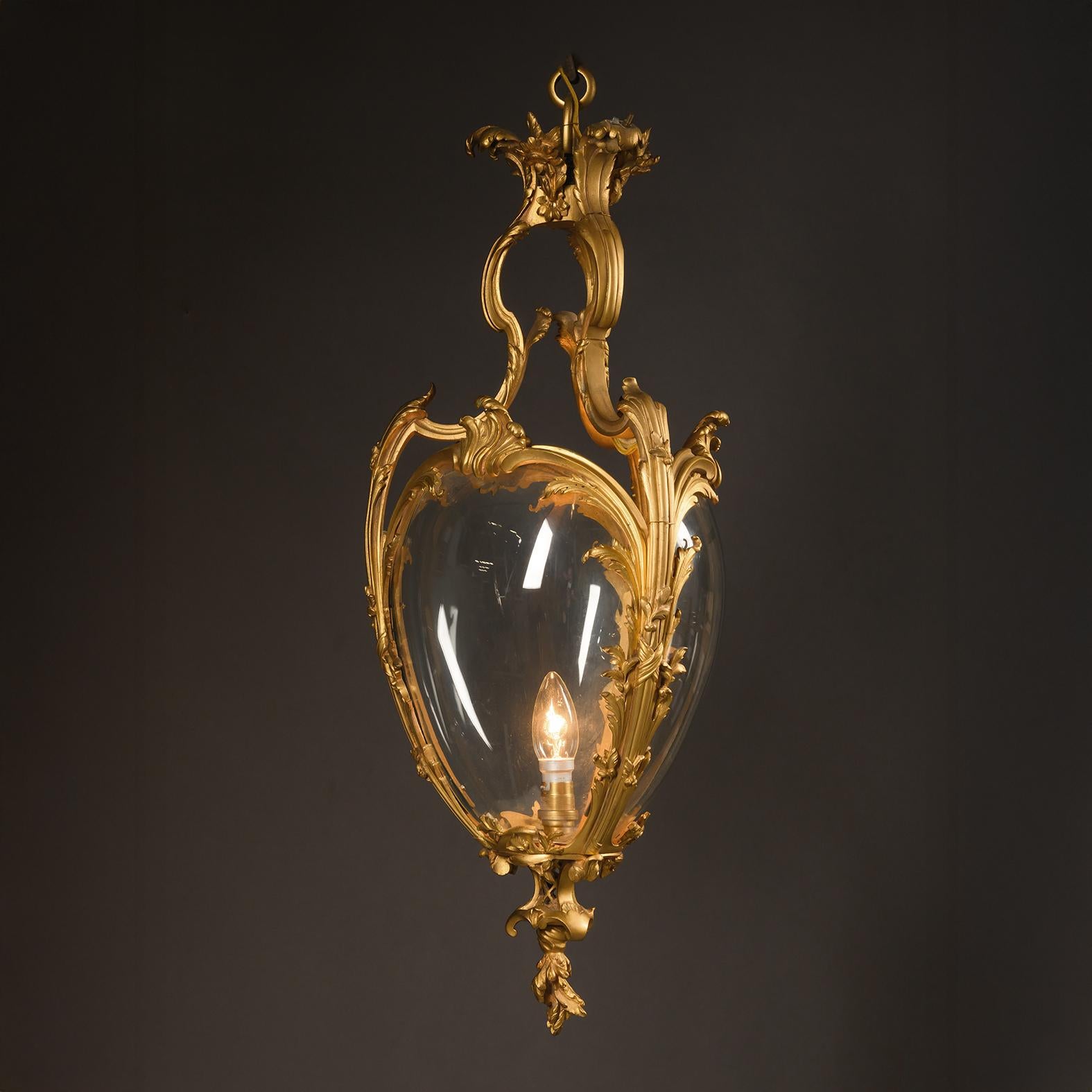 A Fine Louis XV Style Gilt-Bronze Rococo Lantern.  

Finely cast with fronded and scrolling acanthus and ribbon tied foliate decoration.  

French, Circa 1870. 