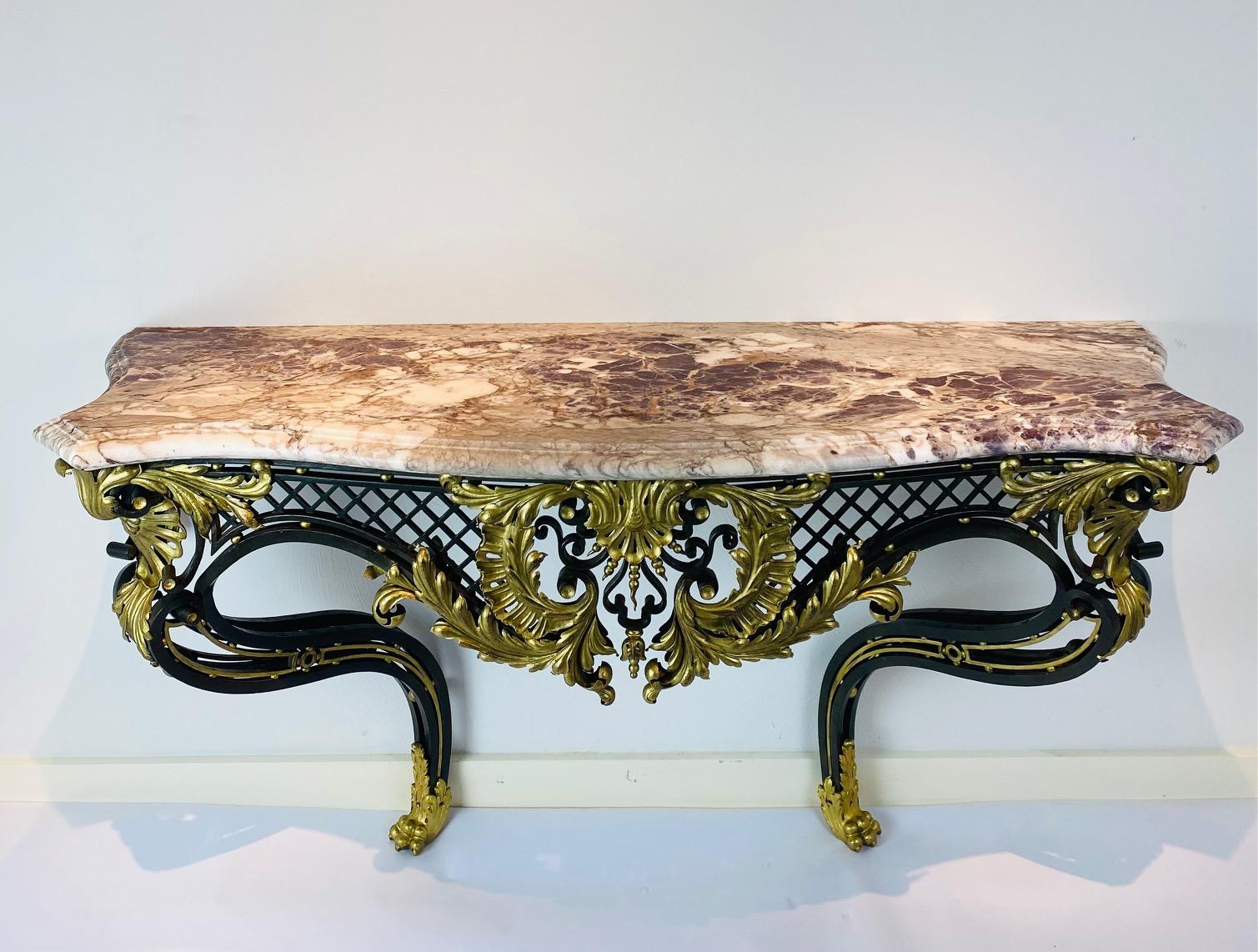 French A Louis XV style iron console with breccia violet top. For Sale