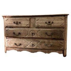 A Louis XV Style Oak Commode