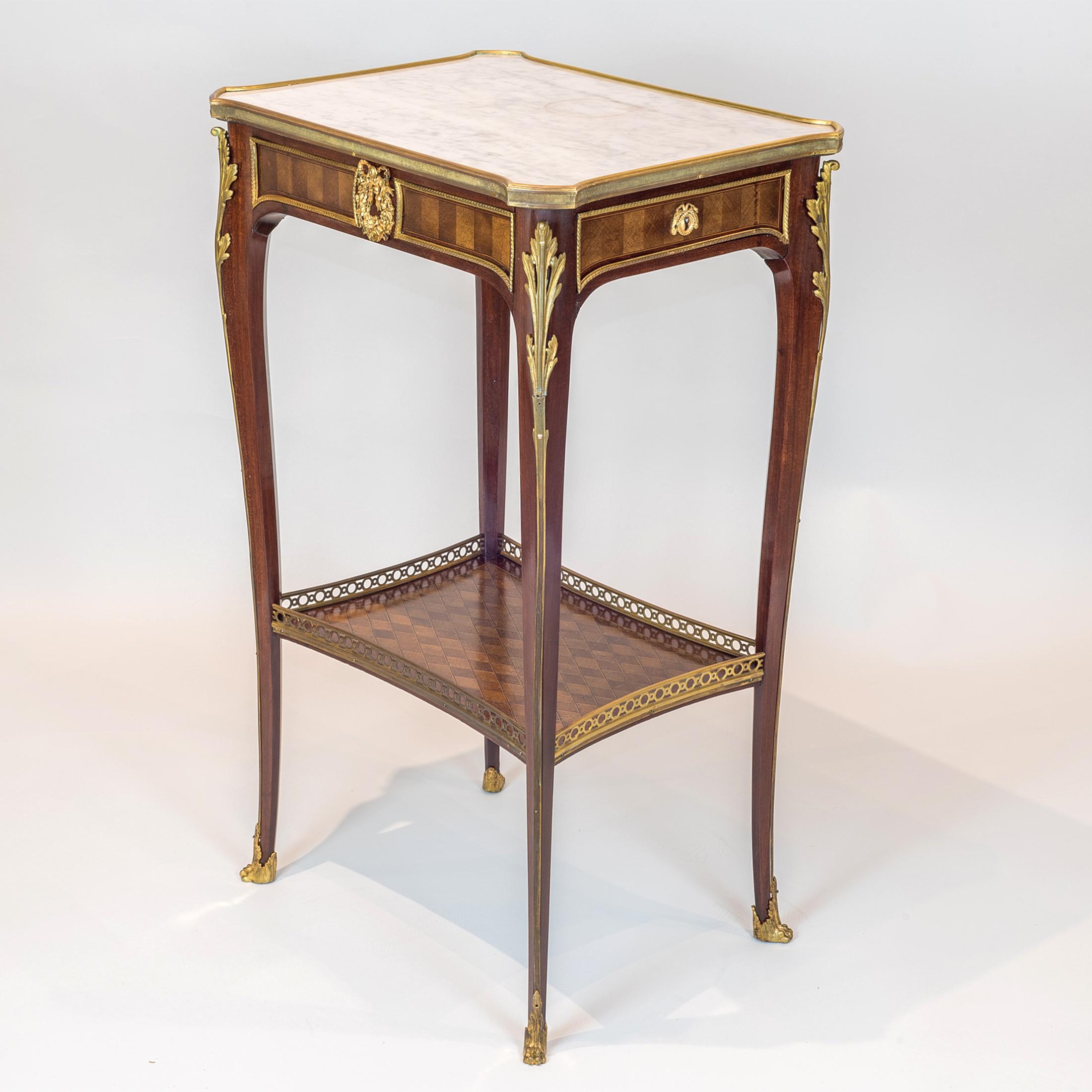 A fine Louis XV-style French Ormolu-mounted mahogany marble-top side table with a side drawer and foliate inlay on cabriole legs.??

Origin: French?
Date: circa 19th century?
Dimension: H 30 1/4 x W 18 1/4 x D 14 inches.