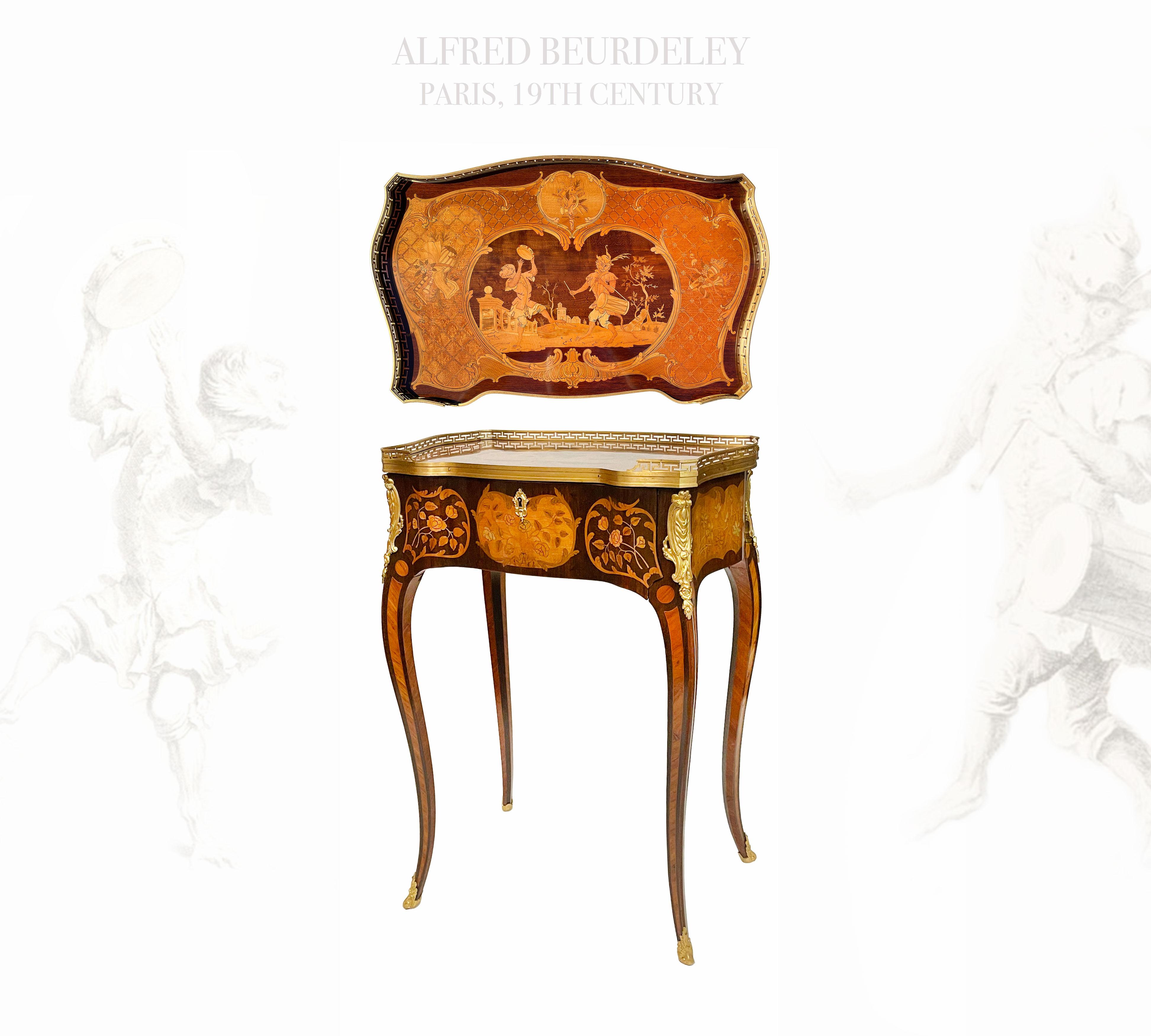 A Louis XV style ormolu-mounted tulipwood, amaranth, satinwood and marquetry lady's writing table
By Alfred Beurdeley, Paris, last quarter 19th century 
Of serpentine outline, the sliding top inlaid with monkeys, dancing and playing musical