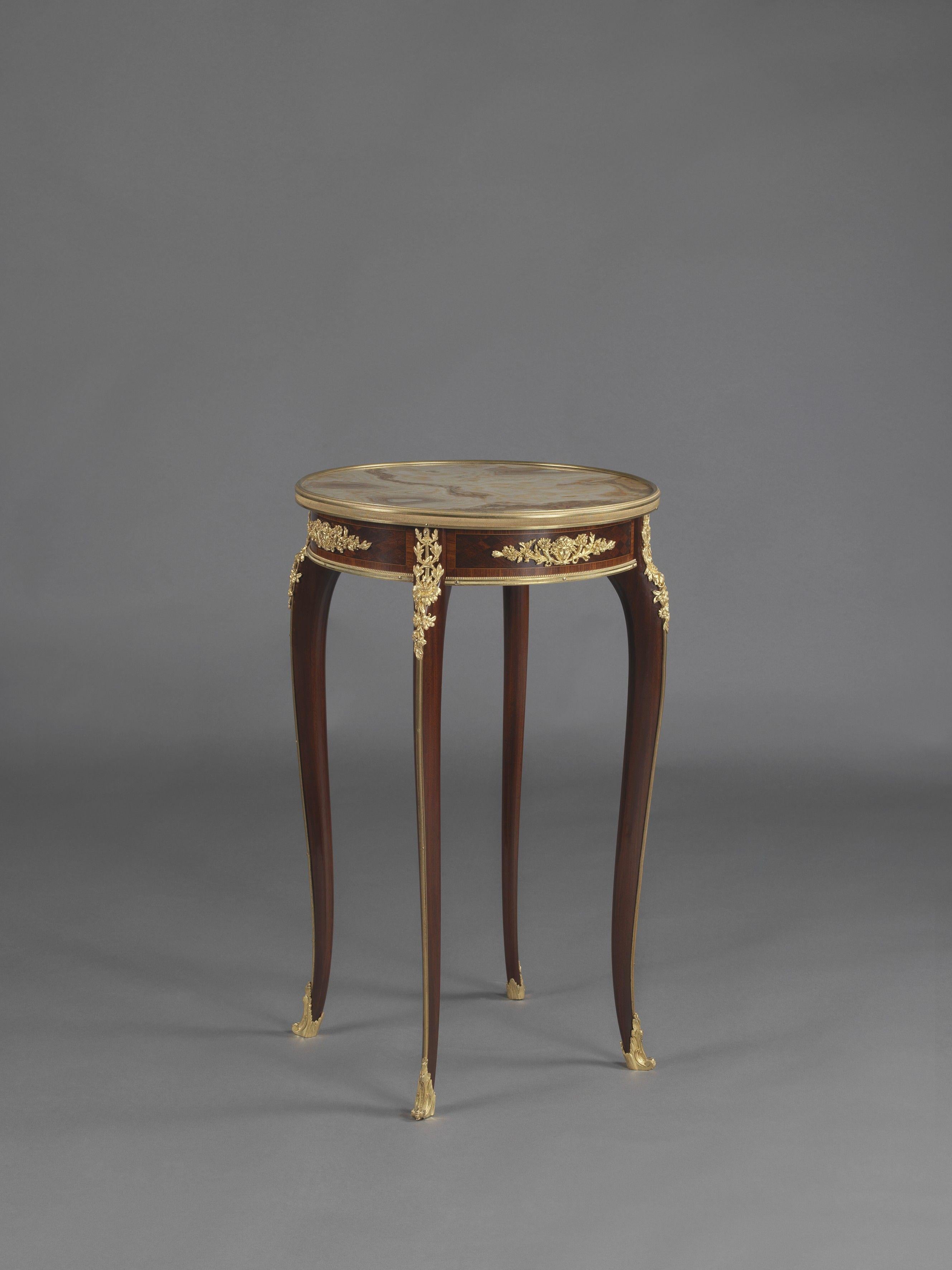 A fine Louis XV style gilt-bronze mounted mahogany Parquetry gueridon with a rare Alabastro Fiorito marble top, attributed to François Linke.

French, circa 1890. 

This fine mahogany gueridon has an inset alabastro fiorito marble top within a