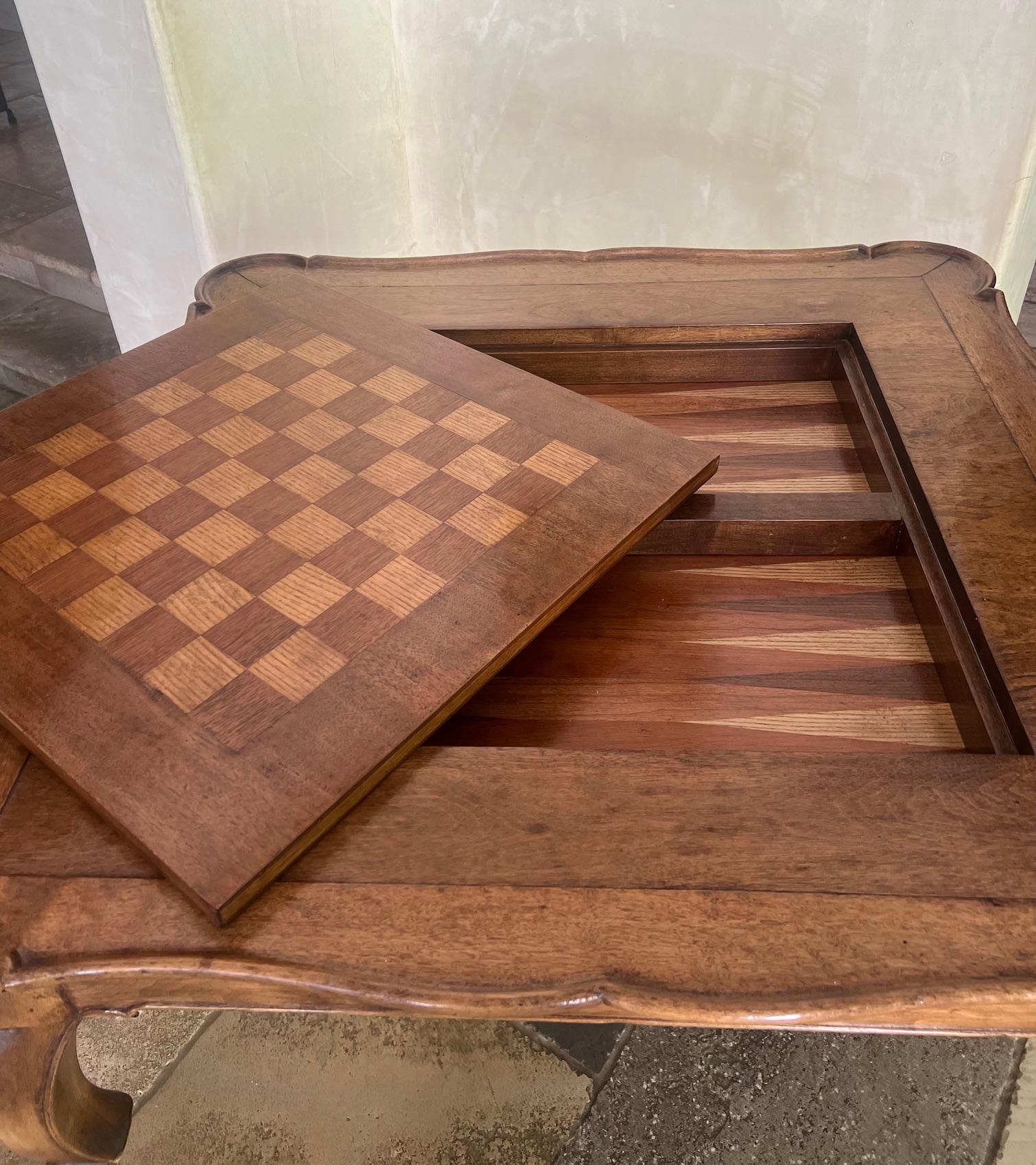 A Louis XV Style Stained Wood Game Table with Inner Compartment 11