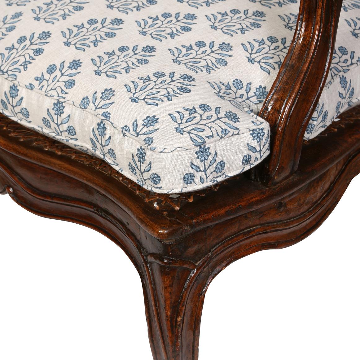 20th Century A Louis XV Style Walnut Chair with a Caned Back and Seat For Sale