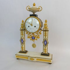 A Louis XVI gilt bronze mounted marble 'Pendule Portique', by Michel-F. Piolaine