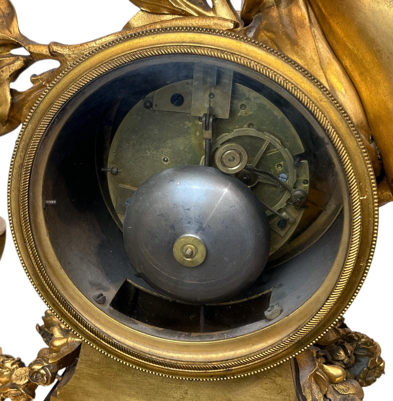 A Louis XVI Ormolu and White Marble Mantel Clock of Cupid For Sale 6