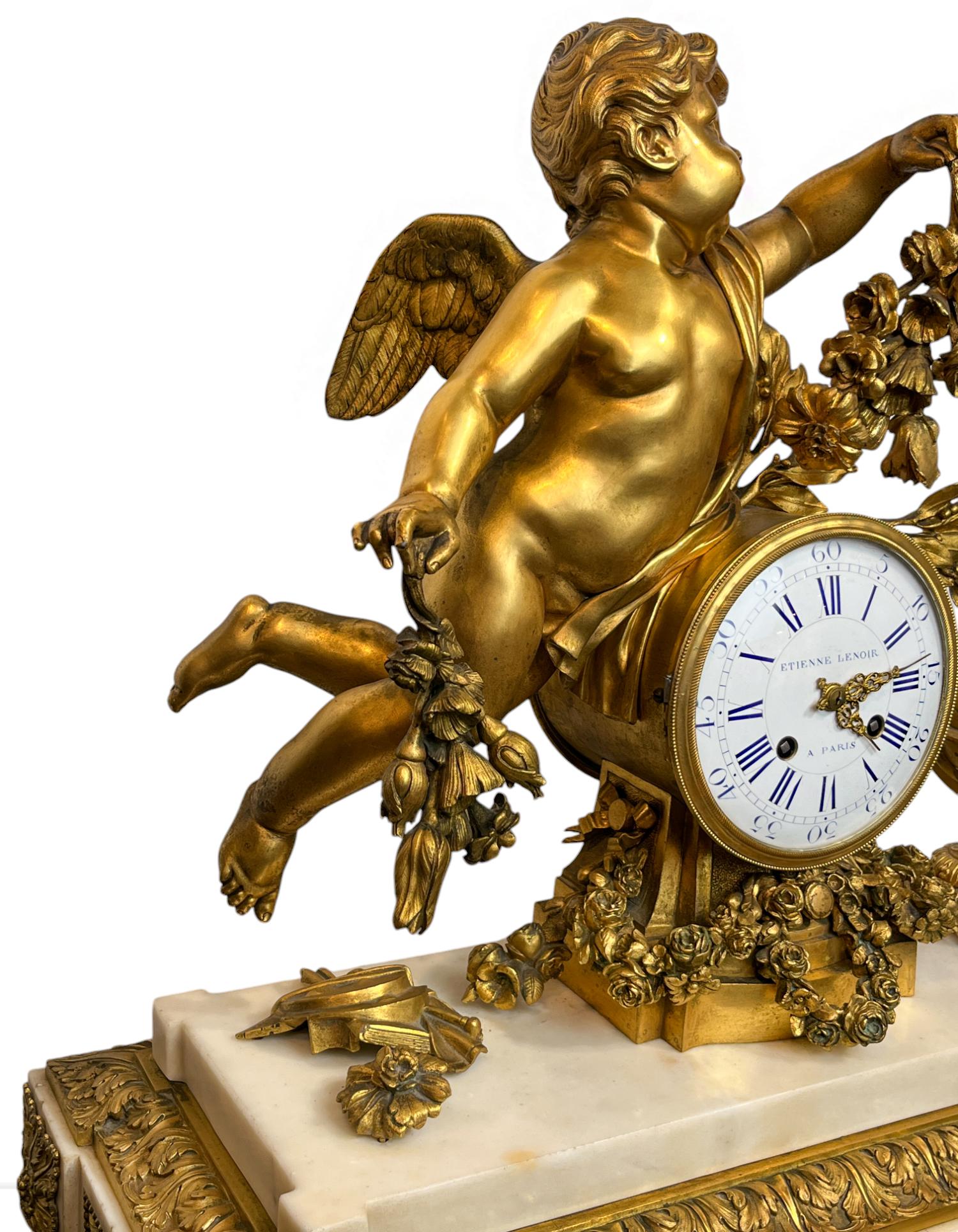 Cast A Louis XVI Ormolu and White Marble Mantel Clock of Cupid For Sale