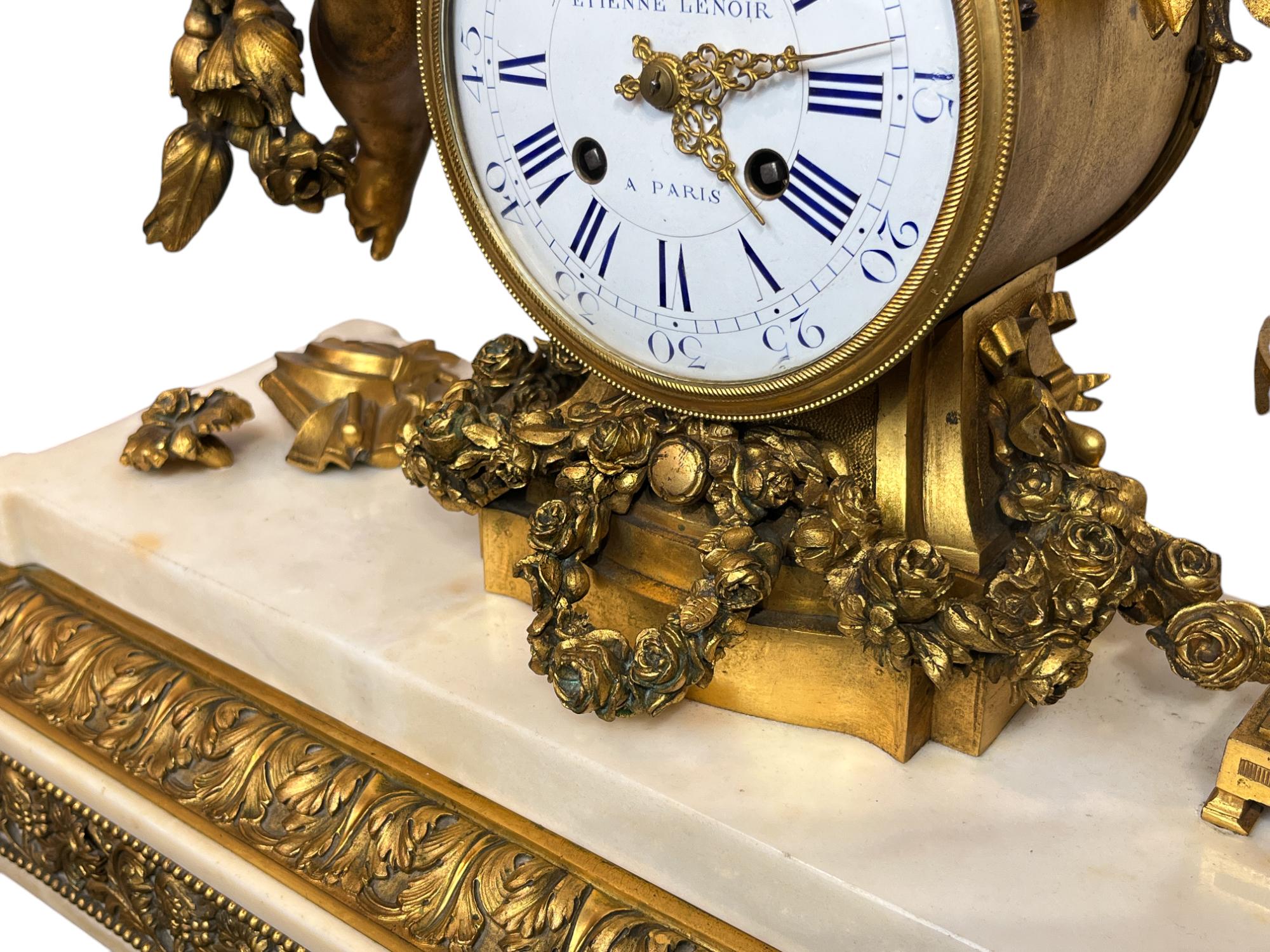 A Louis XVI Ormolu and White Marble Mantel Clock of Cupid For Sale 1