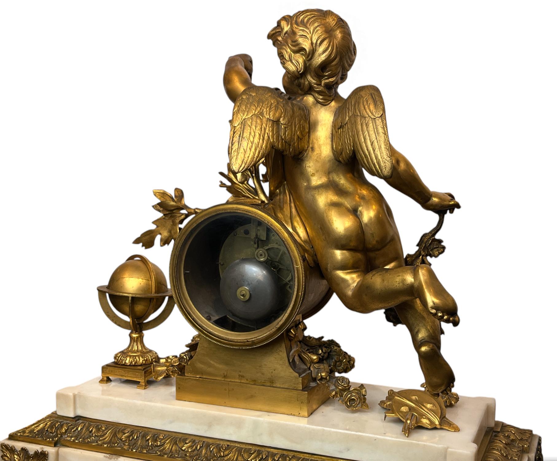 A Louis XVI Ormolu and White Marble Mantel Clock of Cupid For Sale 3