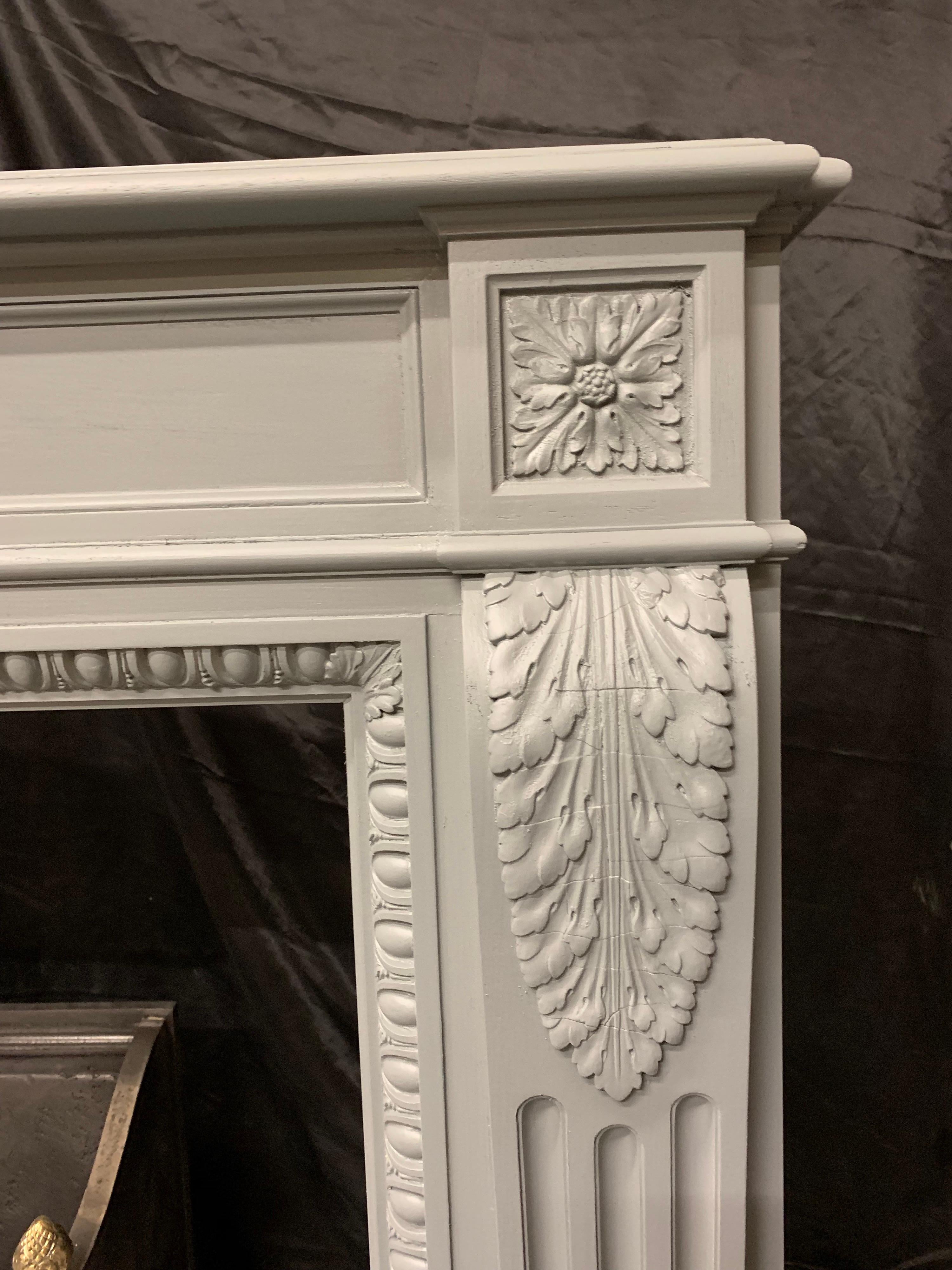 Carved Louis XVI Style 19th Century French Mahogany Fireplace Surround For Sale