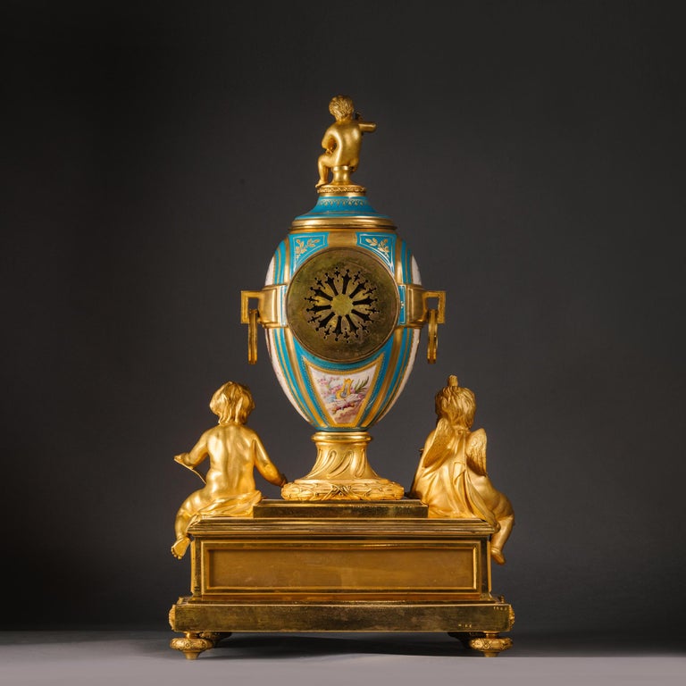 Gilt Louis XVI Style and Sèvres Style Porcelain Mantel Clock by Raingo Frères For Sale